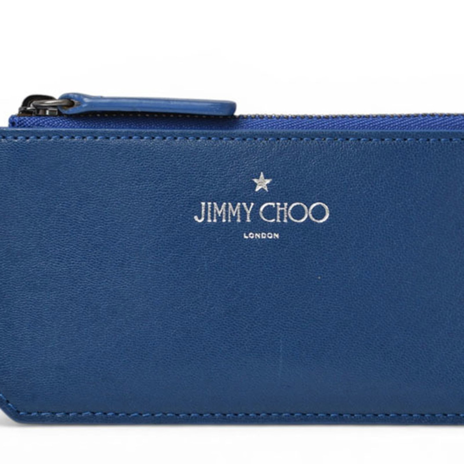Jimmy Choo Case Leather Card: Jimmy Choo Case Leather Card The Jimmy Choo Case Leather Card boasts a sleek, blue leather design with a compact size, making it a stylish accessory for everyday use. Crafted from high-quality