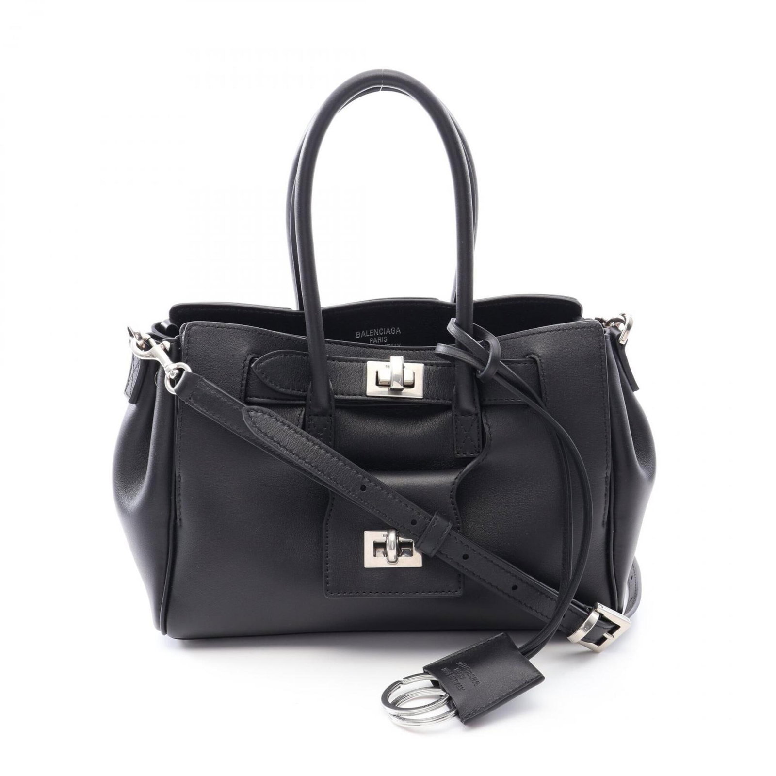 Handbag Leather Balenciaga: Handbag Leather Balenciaga Black leather Balenciaga handbag with a size of 17cm x 24cm x 10cm, perfect for everyday use. This stylish accessory features a sleek design and a compact size, making it ea