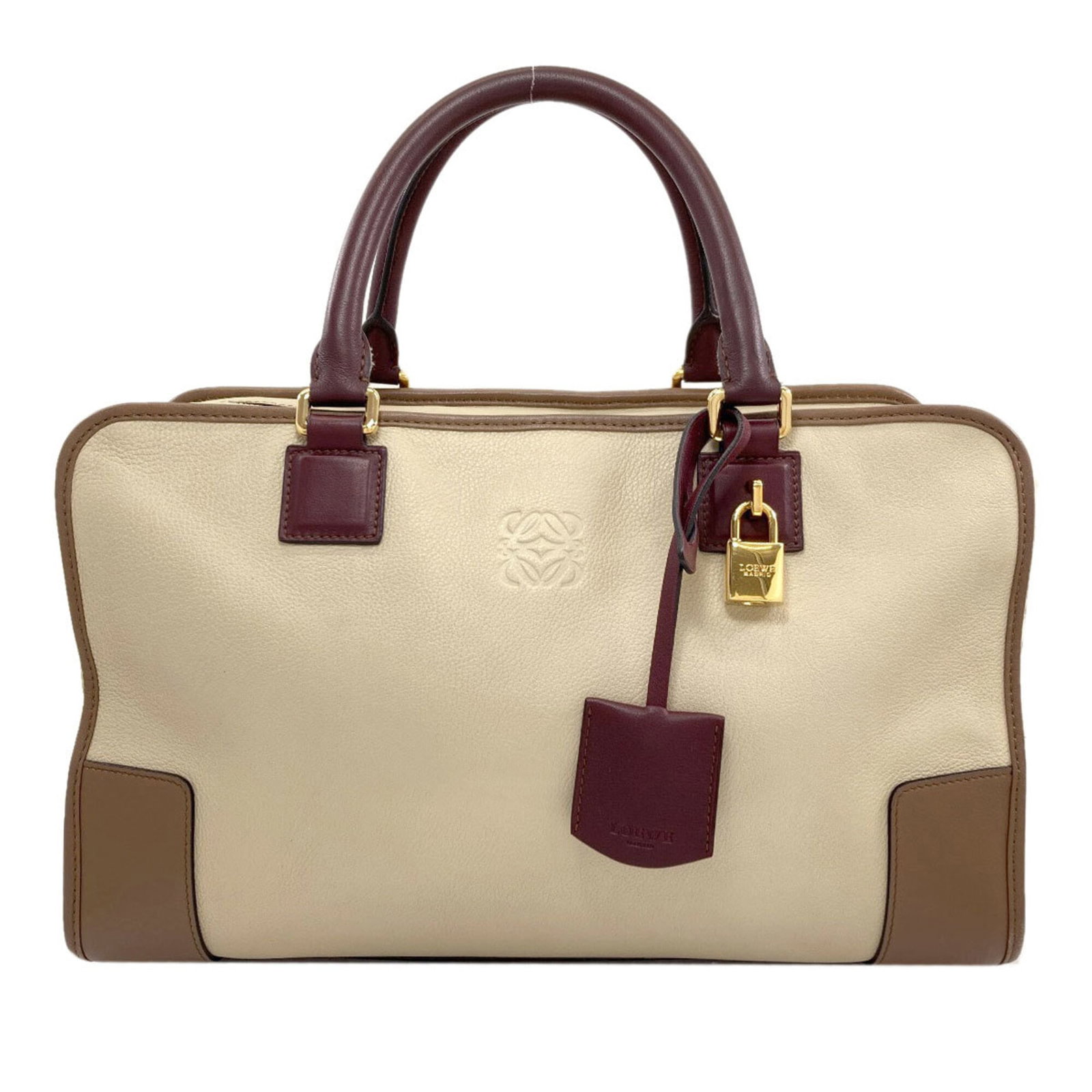 Handbag Leather Handbag: Handbag Leather Handbag This beige leather handbag from Loewe features a classic design with a 22.5cm x 36cm x 14.5cm size, making it a stylish and practical accessory. The bag's high-quality leather 