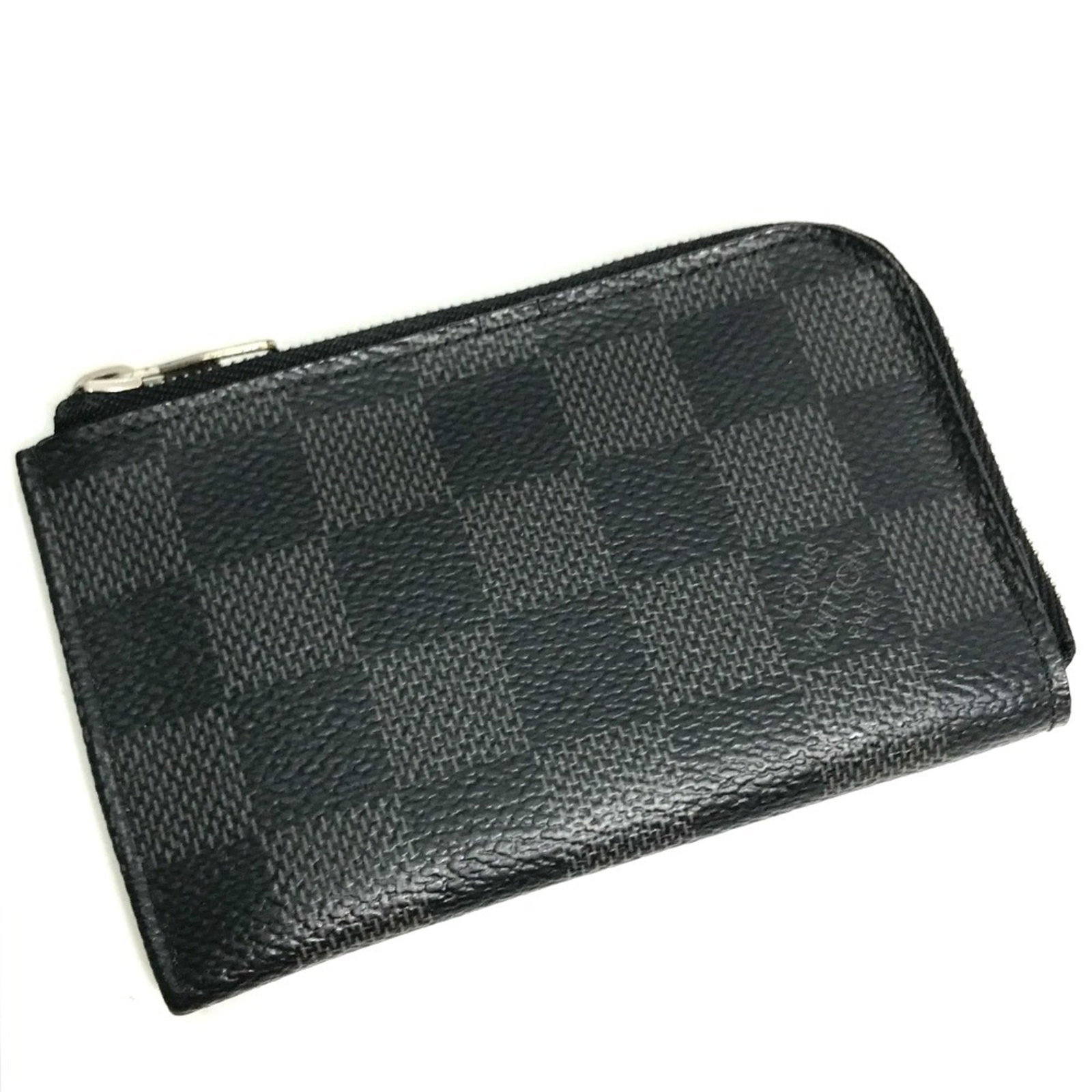 Louis Vuitton Coin Purse/ Coin Case Damier Graphite: Louis Vuitton Coin Purse/ Coin Case Damier Graphite The Louis Vuitton Coin Purse/ Coin Case Damier Graphite is a sleek and sophisticated accessory, featuring the iconic Damier Graphite pattern in