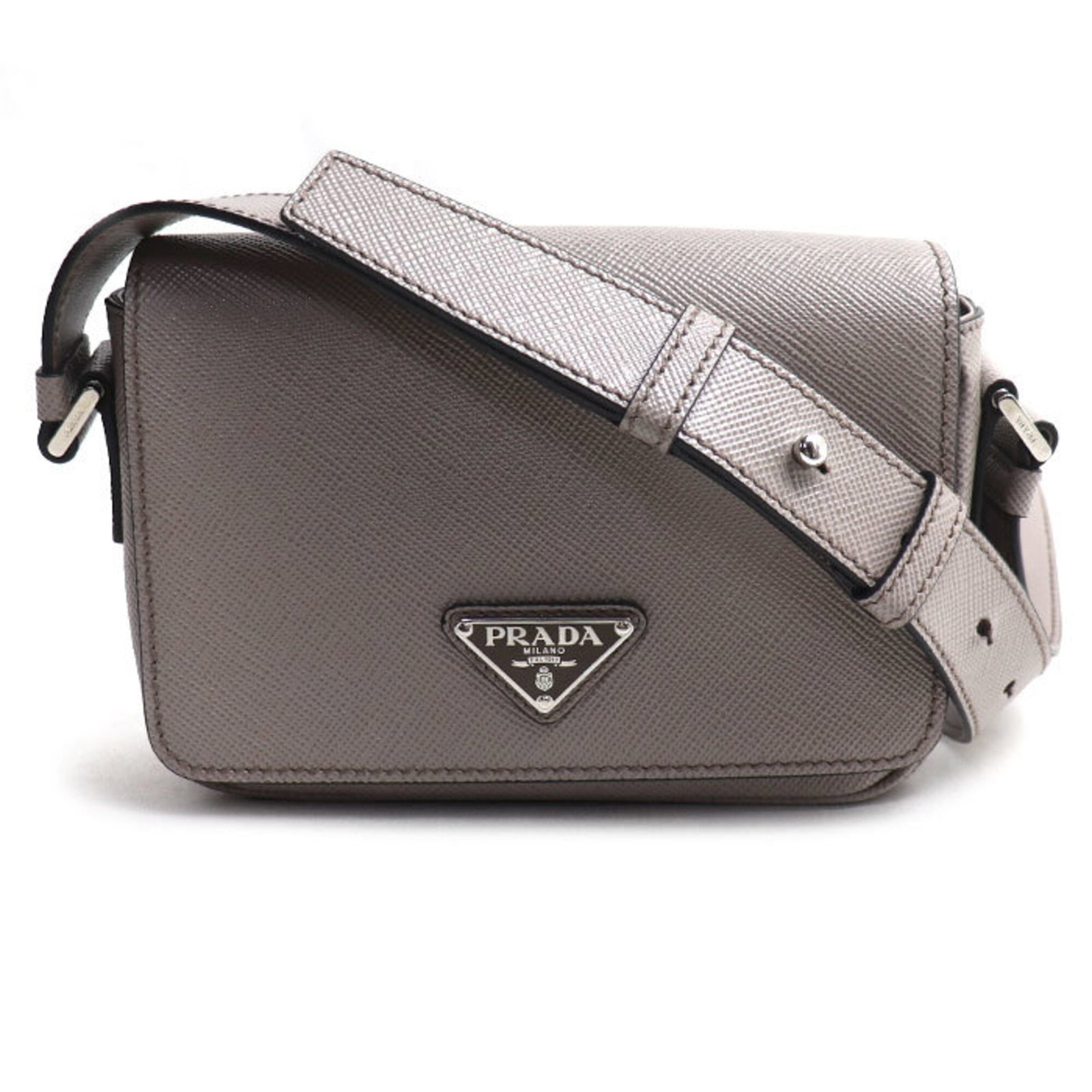 Shoulder Bag Leather Prada: Shoulder Bag Leather Prada Gray leather shoulder bag from Prada, featuring silver hardware and a sleek design. Made from high-quality leather, this bag measures 14cm x 21cm x 5.5cm and has a classic, 