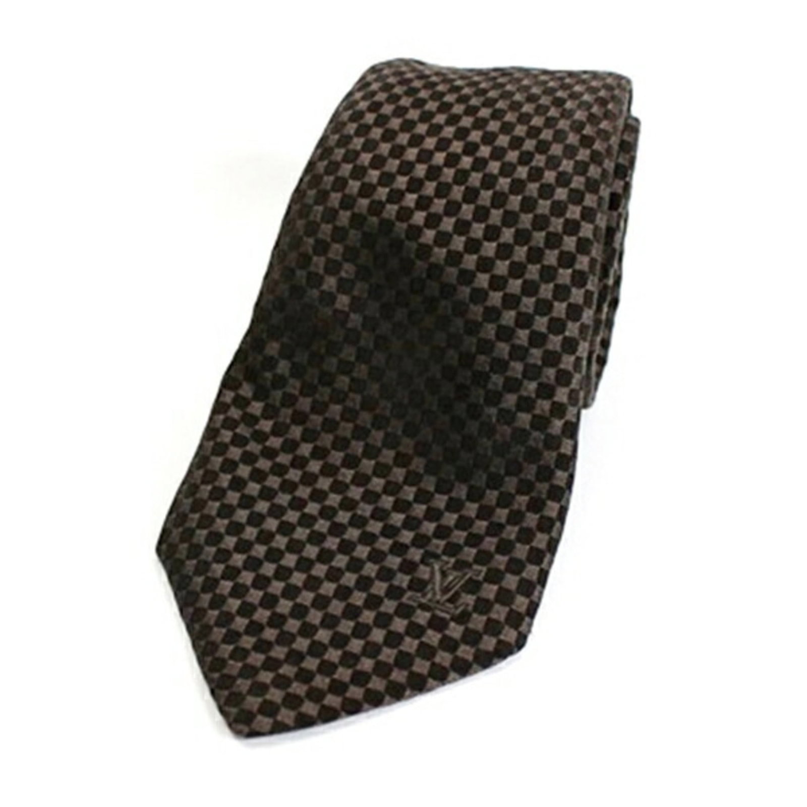 Vuitton Cravat Silk Louis: Vuitton Cravat Silk Louis Silk cravat with a classic Louis Vuitton design, available in brown. Made from high-quality silk, this cravat measures 10cm in width. A timeless accessory for those who
