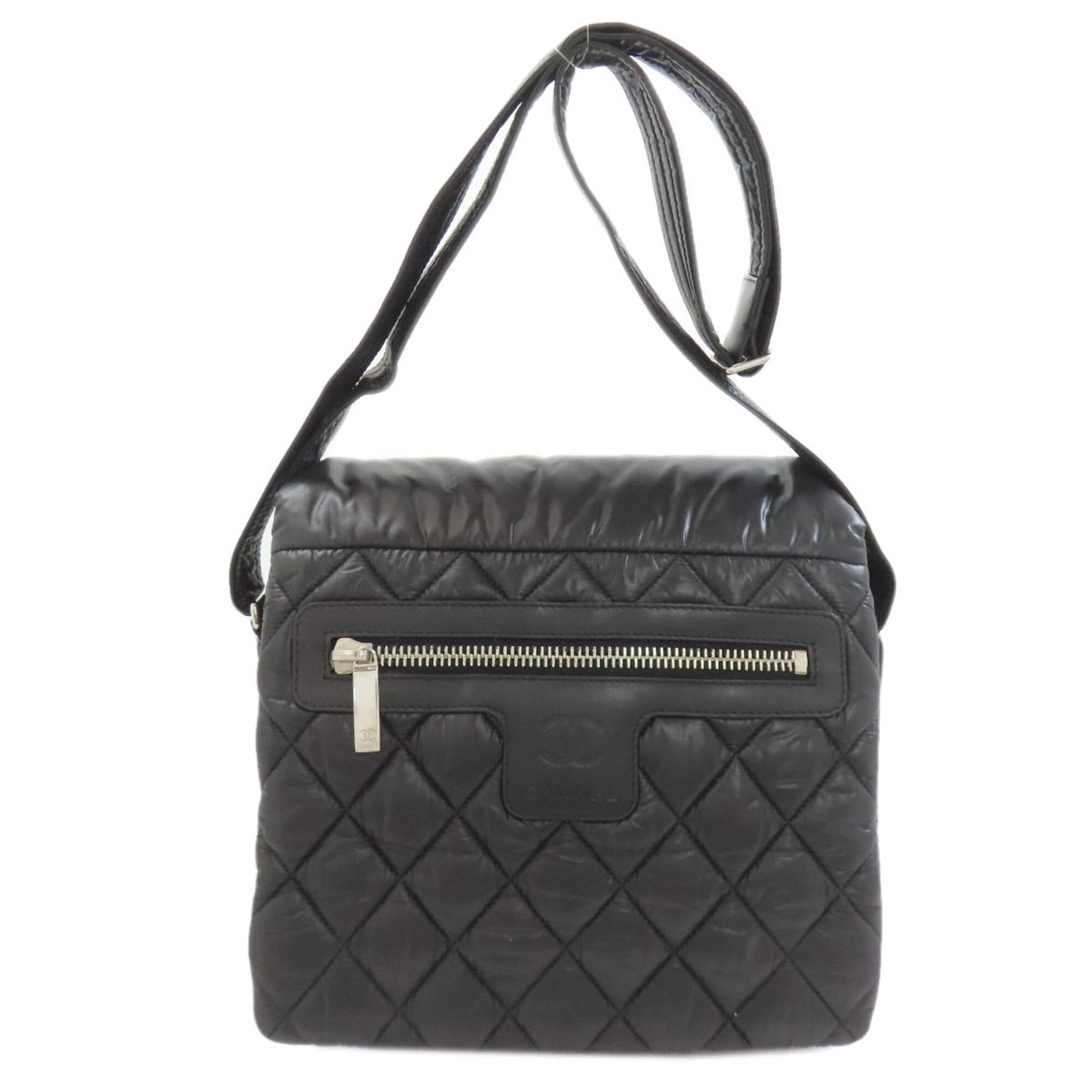 Nylon Chanel Bag Shoulder: Nylon Chanel Bag Shoulder Nylon Chanel Bag Shoulder features a sleek black design with a zipper closure and adjustable strap length, ranging from 27.36'' to 52.36''. This shoulder bag measures 20cm x 