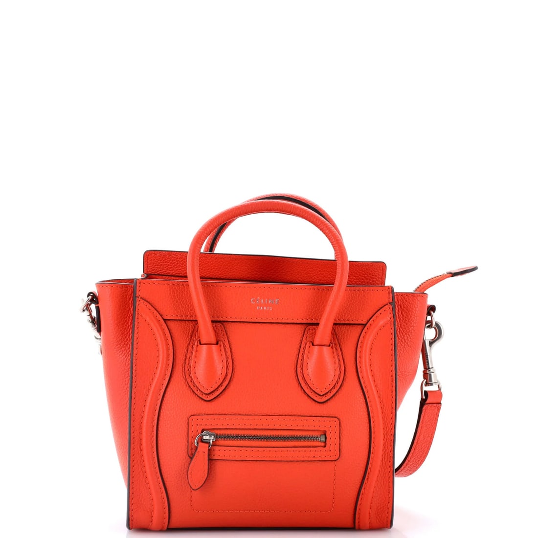 Luggage Bag Grainy Leather Nano Celine: Luggage Bag Grainy Leather Nano Celine The Celine Luggage Bag Grainy Leather Nano is a stylish and functional cross-body bag with a vibrant orange exterior. Measuring just 8" x 8" x 4", this compact