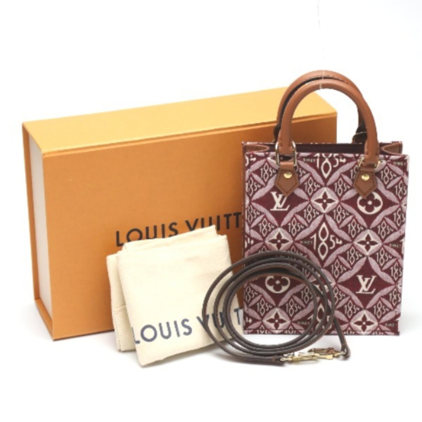 Shoulder Bag Leather Louis Vuitton: Shoulder Bag Leather Louis Vuitton Red leather shoulder bag from Louis Vuitton, featuring a classic design with a 14cm x 4.5cm size and 5.51'' x 1.77'' dimensions. Comes with a box, dust bag, and