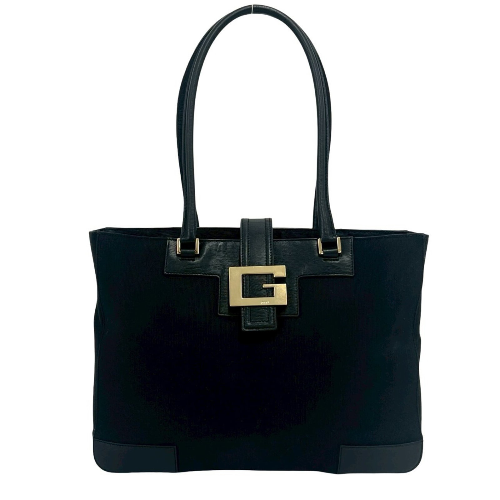 Handbag Tote Bag Canvas Leather Gucci: Handbag Tote Bag Canvas Leather Gucci Canvas and leather combine in this sleek Gucci tote bag, measuring 24.5cm x 33cm x 6.5cm. The black color and classic design make it a versatile accessory for
