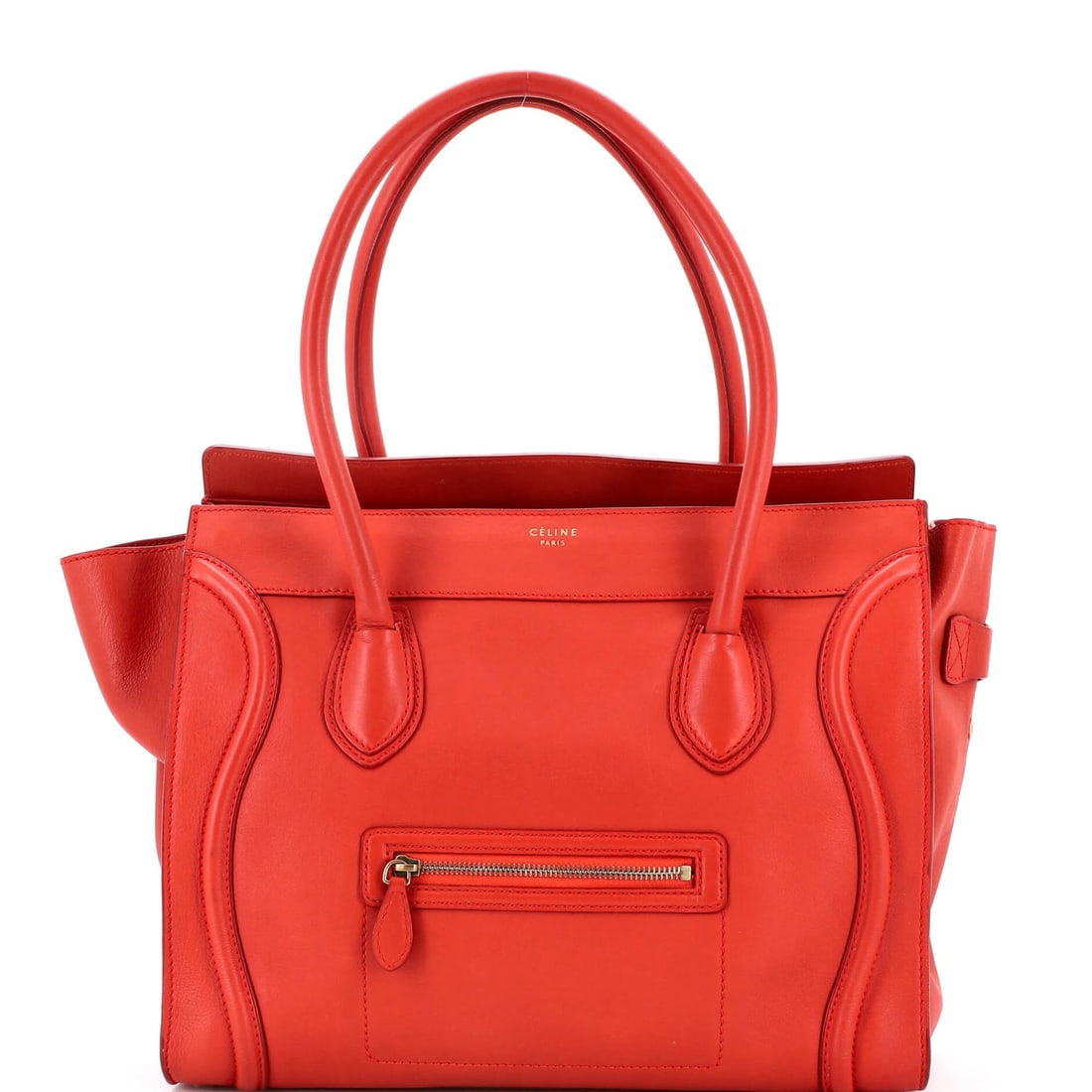 Smooth leather medium Celine bag: Smooth leather medium Celine bag Smooth leather medium Celine bag in bold red, featuring a classic totes style with a medium size and aged gold hardware. The exterior shows signs of wear, including