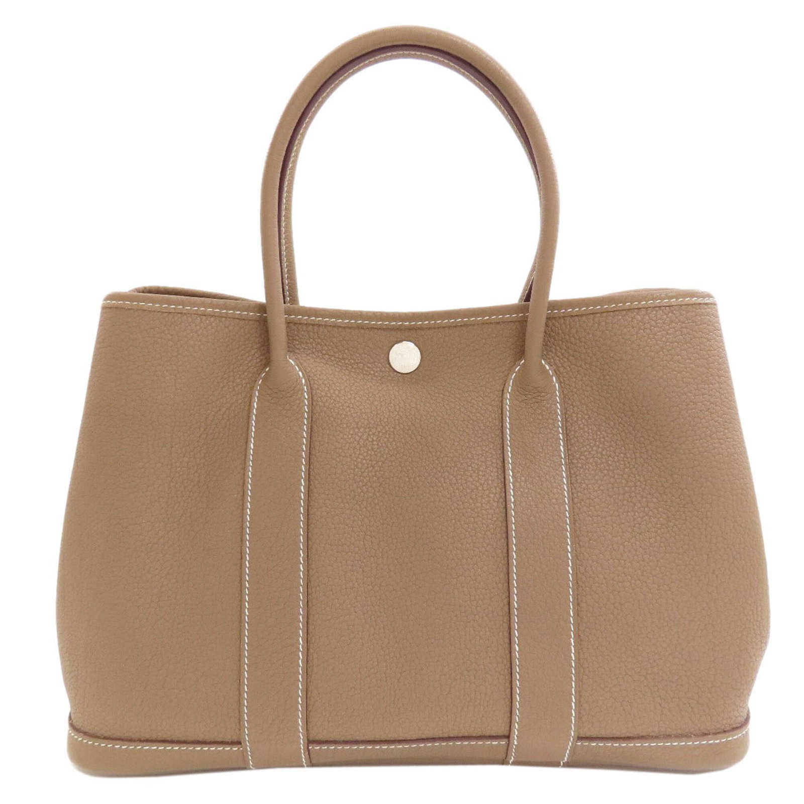 Handbag Hermes Negonda Leather: Handbag Hermes Negonda Leather The Negonda leather handbag from Herm?s boasts a sleek, sophisticated design with its Etoupe gray color and refined dimensions. Measuring 20.5cm x 30cm x 14cm, this