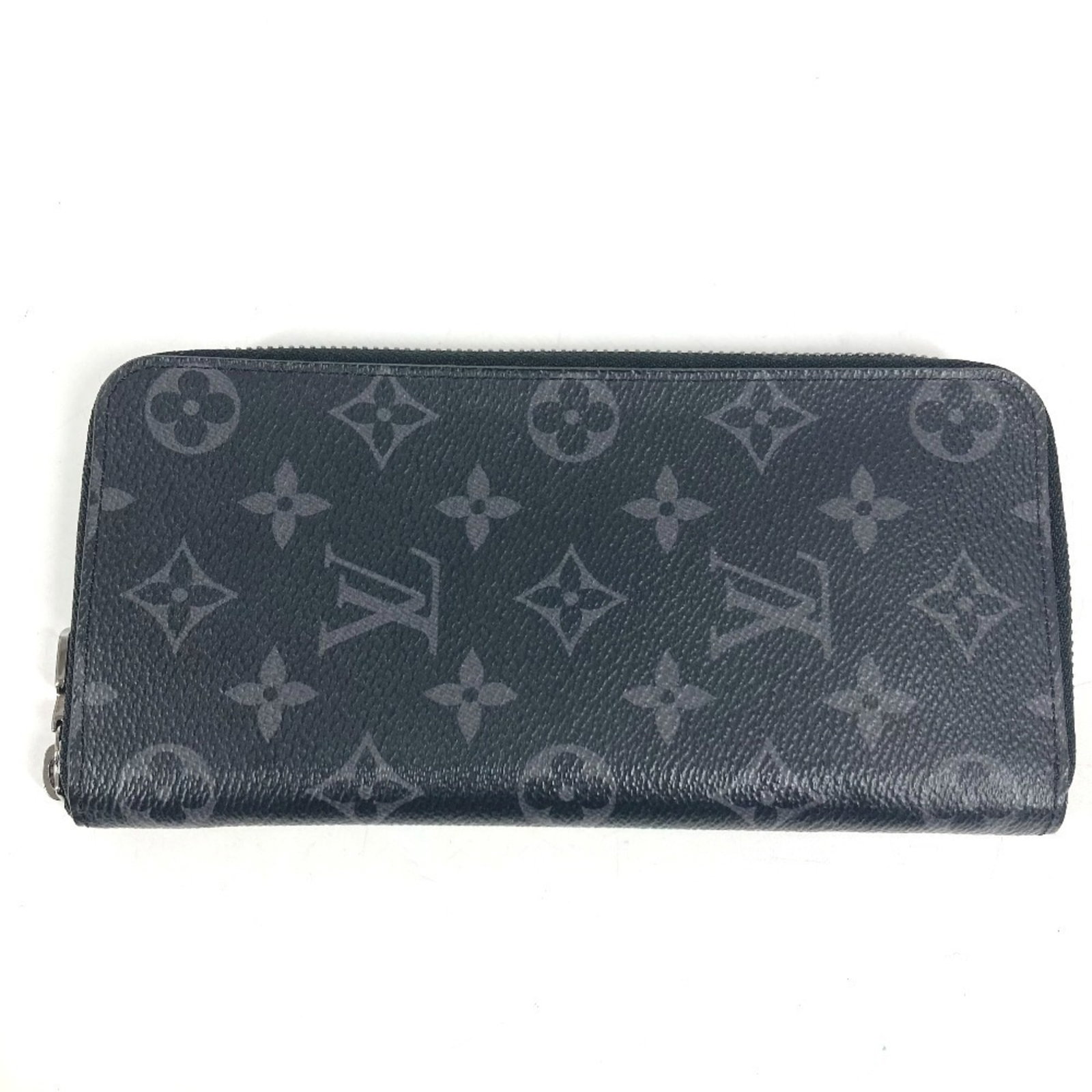 Vuitton Louis Long Wallet Monogram Eclipse Bi Fold Canvas: Vuitton Louis Long Wallet Monogram Eclipse Bi Fold Canvas Monogram Eclipse canvas provides a sleek, modern look to this Louis Vuitton Louis Long Wallet, featuring a signature black color. The bi-fold 