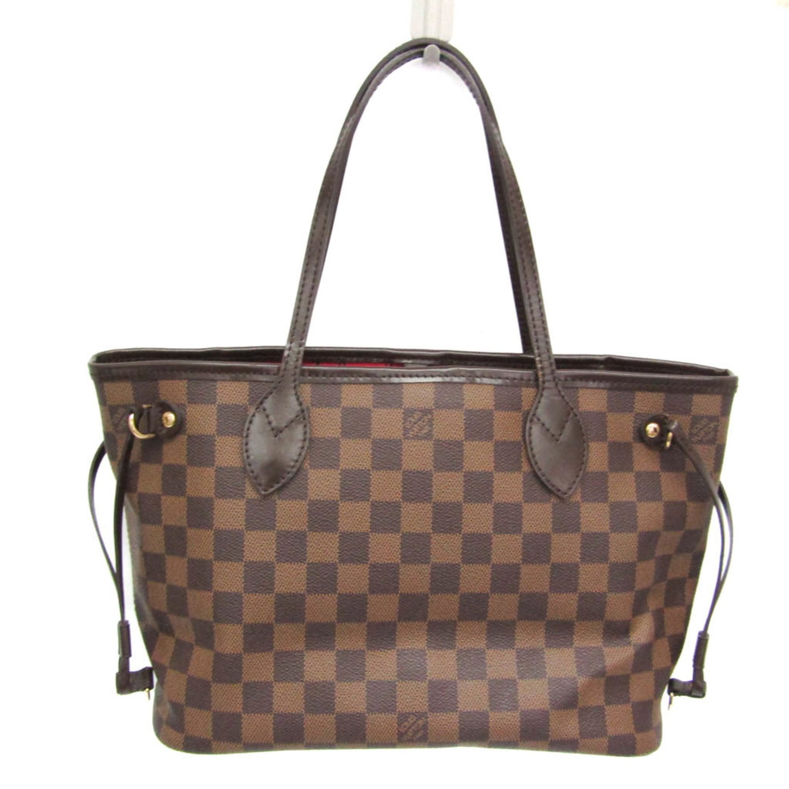 Damier Canvas Louis Vuitton Tote: Damier Canvas Louis Vuitton Tote Damier Canvas Louis Vuitton Tote features a classic design with a top width of 36cm and a spacious interior. The Ebene color Damier canvas material provides a timeless