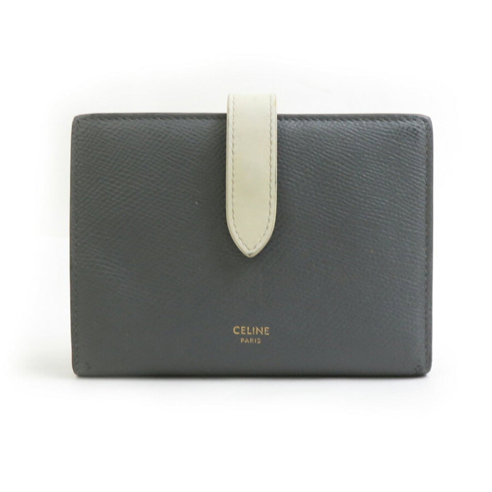 Celine Wallet (Bi-Fold) Leather: Celine Wallet (Bi-Fold) Leather Gray, Ivory Celine Bi-Fold Leather Wallet. Made from high-quality Italian leather, this bi-fold wallet features a sleek and sophisticated design. With its classic size