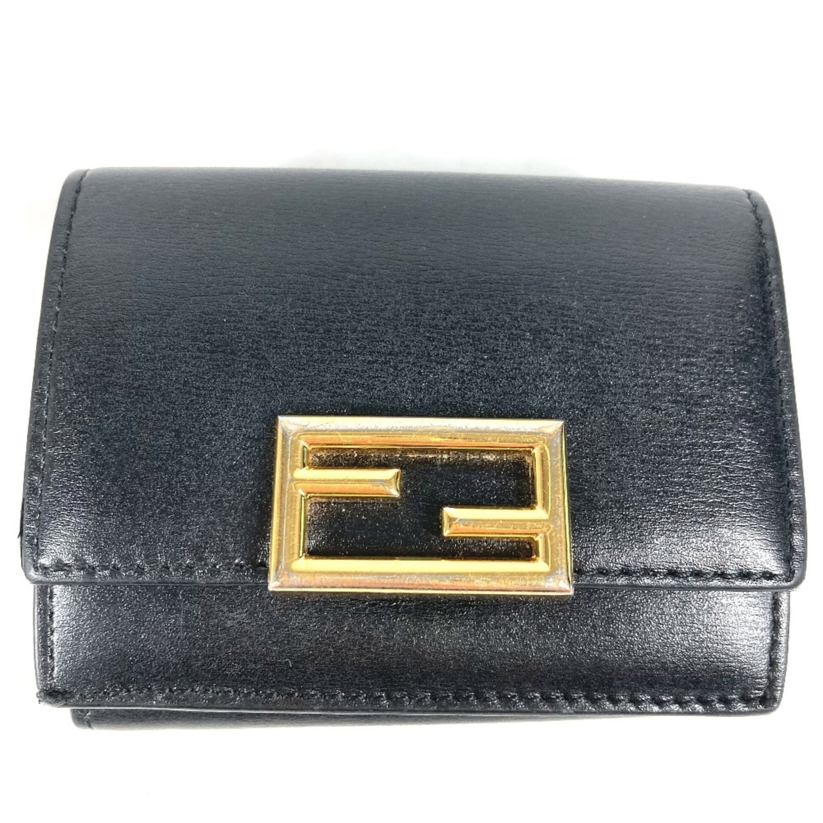 Fendi Wallet (Tri-Fold) Leather: Fendi Wallet (Tri-Fold) Leather Black tri-fold leather wallet from Fendi, featuring a classic design with a sleek black finish. This wallet comes with a box and dust bag for added protection and