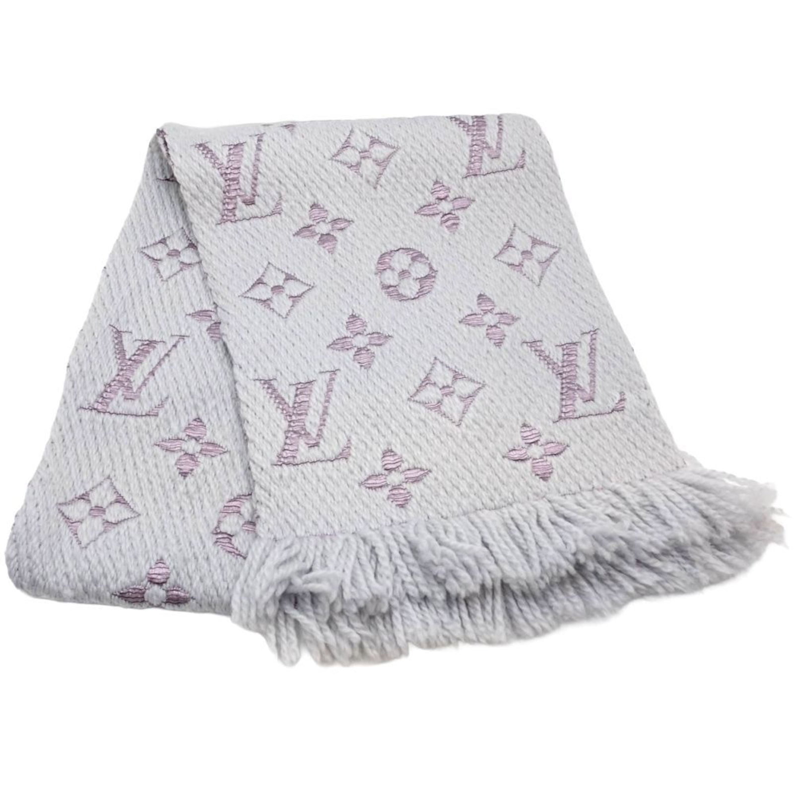 Silk Wool Stole Louis Vuitton: Silk Wool Stole Louis Vuitton Silk and wool blend in a luxurious gray and light purple hue, creating a sophisticated and elegant stole from Louis Vuitton. Measuring 1.7m x 30cm, this stole boasts a