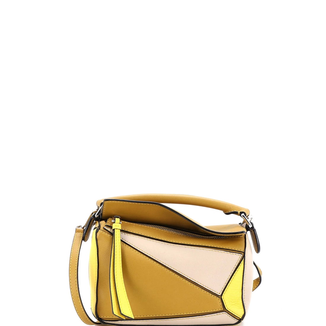 Loewe Puzzle Bag Leather Mini: Loewe Puzzle Bag Leather Mini The Loewe Puzzle Bag Leather Mini is a stylish and compact cross body bag made from neutral-colored leather. With a silver-toned buckle and minor scuffs, this bag