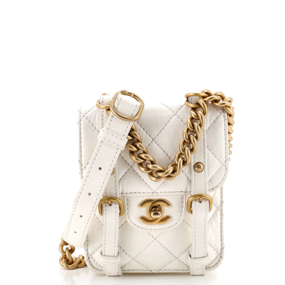 Aged Calfskin Quilted Mini Messenger Flap City Bag Chanel: Aged Calfskin Quilted Mini Messenger Flap City Bag Chanel Aged Calfskin Quilted Mini Messenger Flap City Bag from Chanel features a classic white exterior with subtle creases and discoloration,