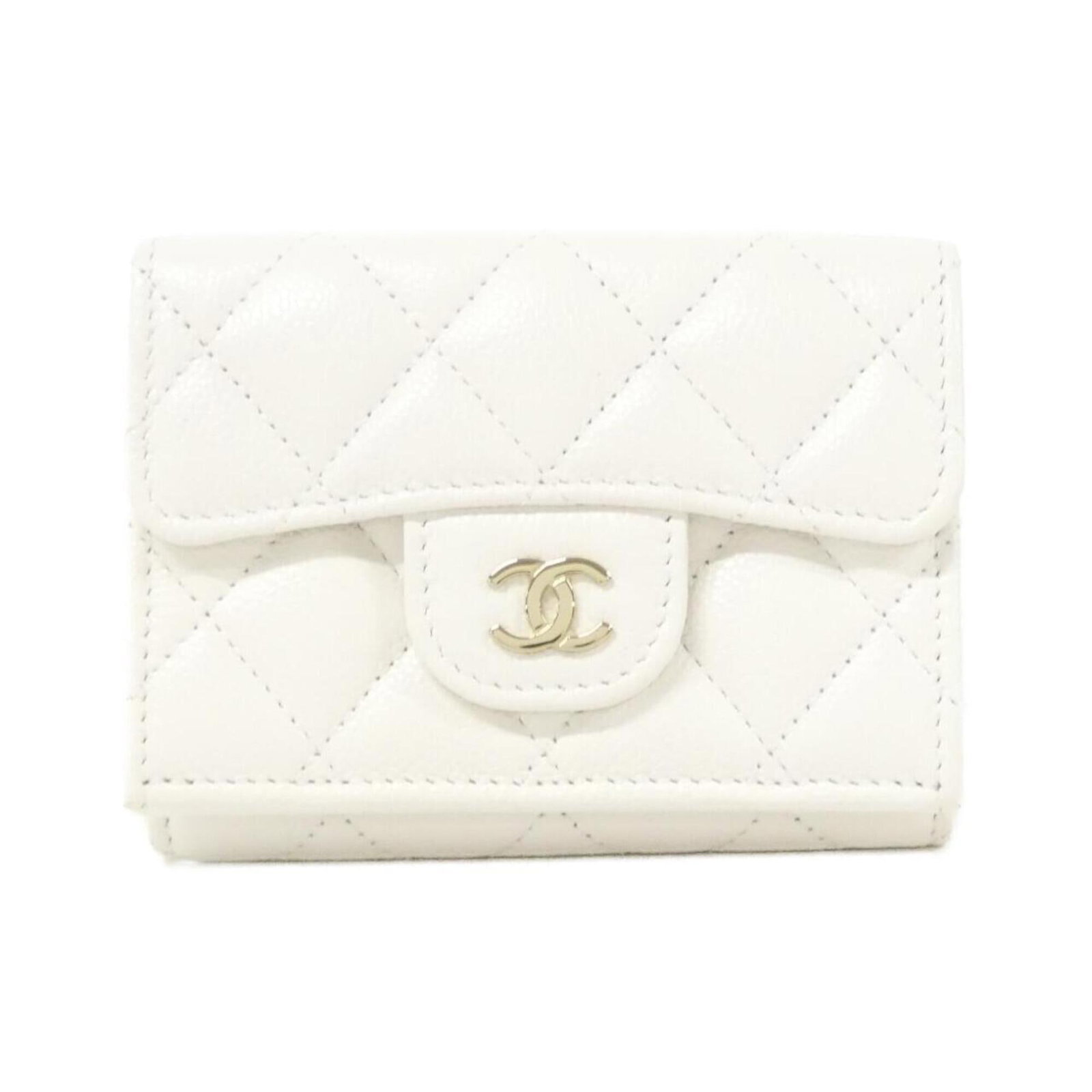 Chanel Wallet (Tri-Fold) Grained Calfskin: Chanel Wallet (Tri-Fold) Grained Calfskin Tri-fold design with a classic Chanel aesthetic, this white grained calfskin wallet features clean lines and a timeless look. Made from high-quality grained