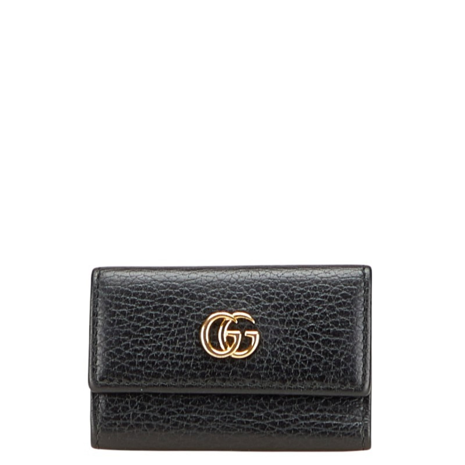 Keycase Leather Gucci: Keycase Leather Gucci Black leather keycase from Gucci, measuring 6cm x 9.5cm x 1cm, bears a signature. Made from high-quality leather, this keycase is a stylish accessory for everyday use. Its sleek