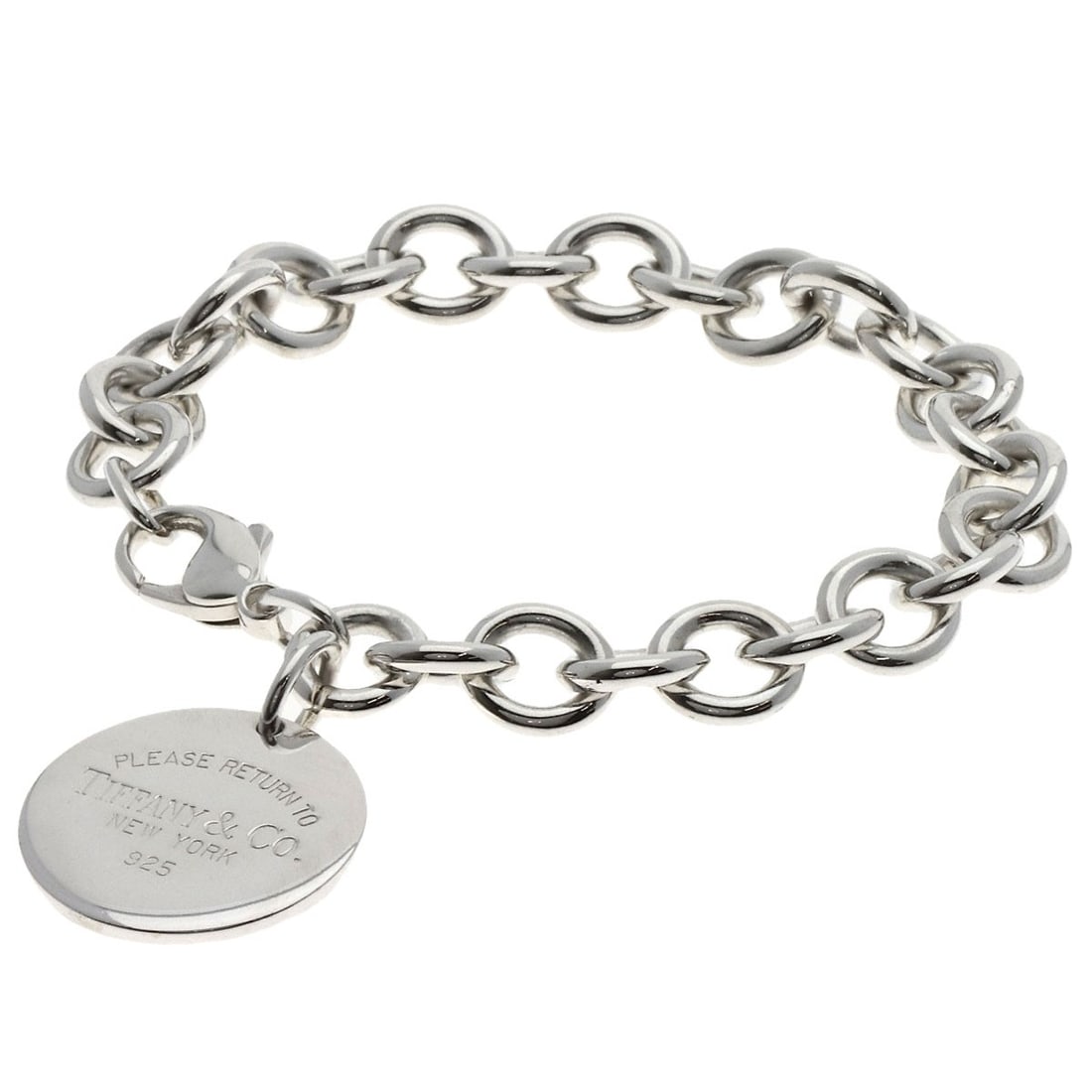 Return Tiffany Round Silver Bracelet: Return Tiffany Round Silver Bracelet Silver Tiffany Round Bracelet, a classic design from the renowned brand, features a sleek and modern silhouette crafted from sterling silver. This elegant bracelet