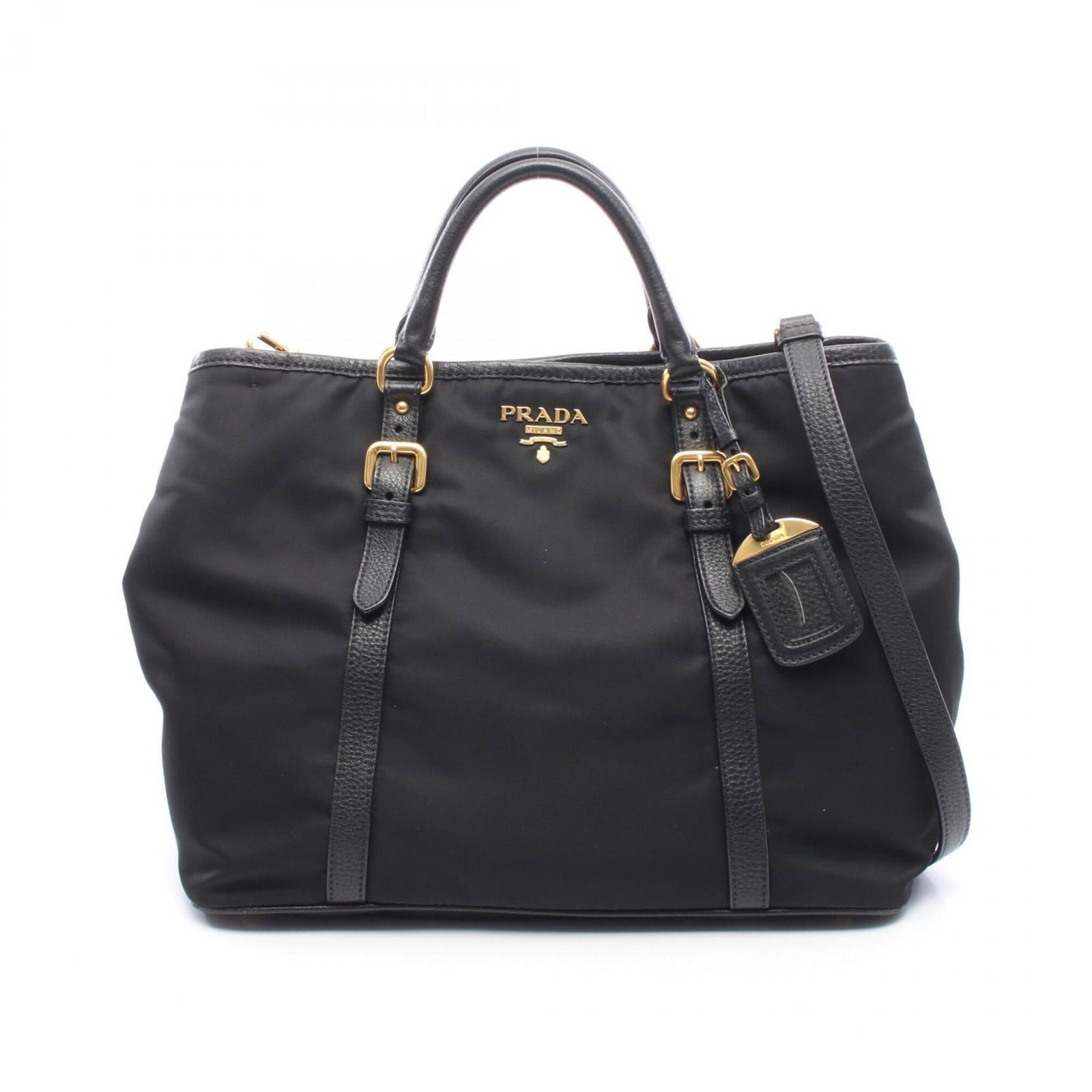 Handbag Nylon Leather Prada: Handbag Nylon Leather Prada Nylon and leather construction gives this Prada handbag a unique blend of textures and durability. Measuring 27cm x 34.5cm x 16.5cm, it features a sleek black design that