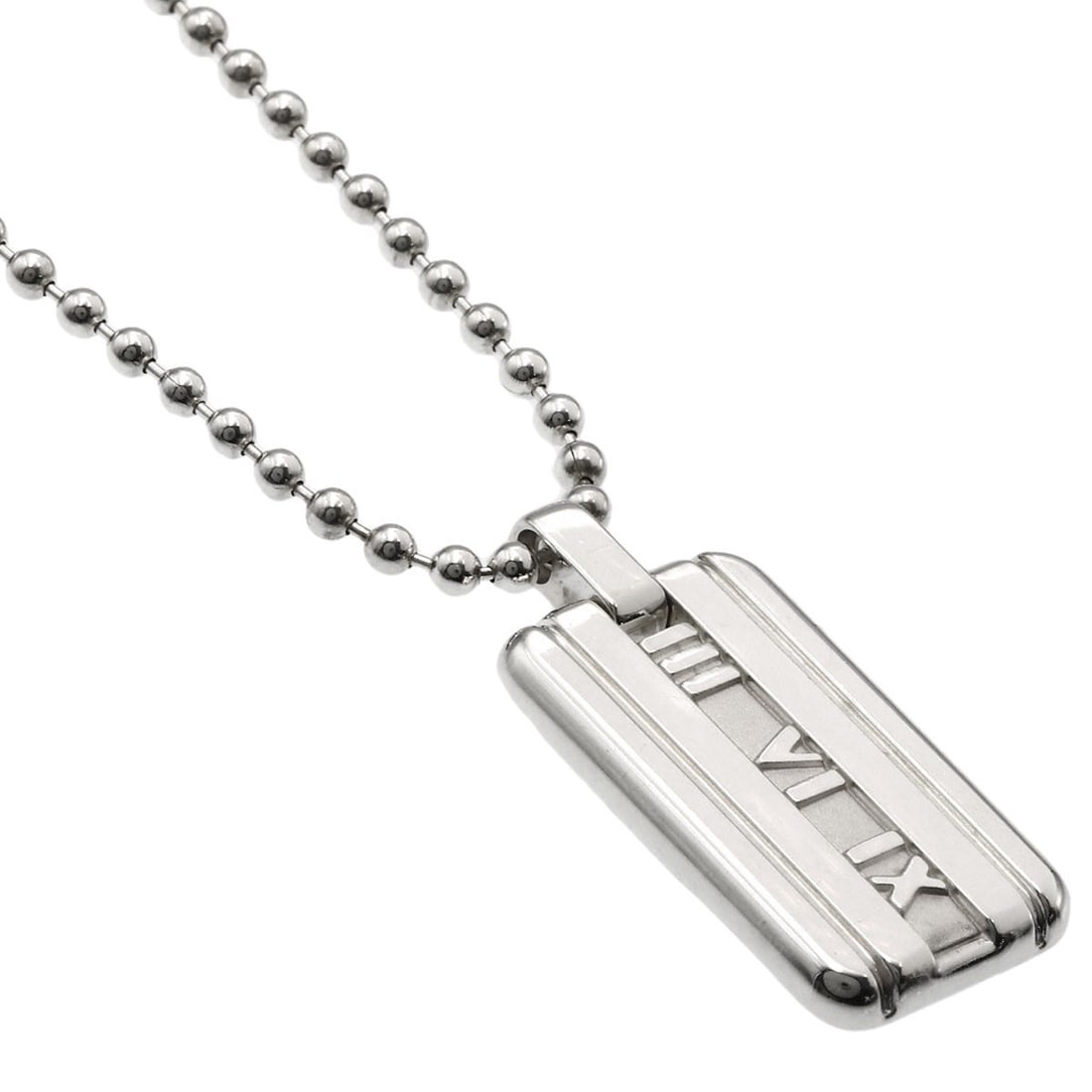 Silver Necklace Atlas Tag Tiffany&Co.: Silver Necklace Atlas Tag Tiffany&Co. Silver Necklace Atlas Tag Tiffany&Co. is a sleek and sophisticated accessory featuring a silver metal design with no stone. Measuring 16.1 inches in length, this