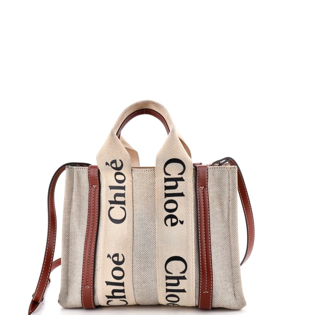 Chloe Woody Convertible Tote Canvas with Leather Small: Chloe Woody Convertible Tote Canvas with Leather Small Canvas and leather combine in this Chloe Woody Convertible Tote, featuring a neutral exterior and gold-tone hardware. The tote's small size and