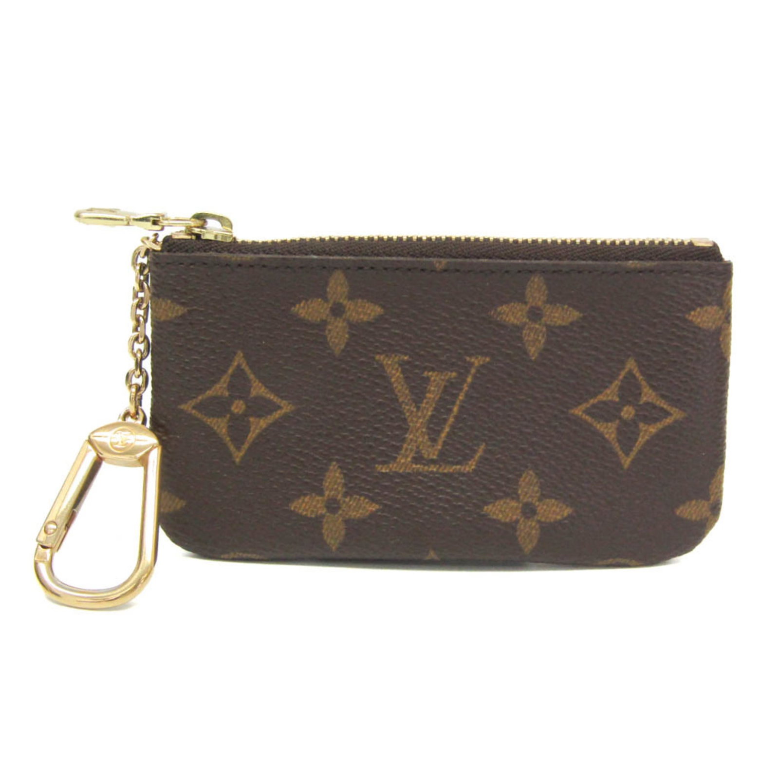 Coin purse Monogram Louis Vuitton: Coin purse Monogram Louis Vuitton Monogram Louis Vuitton coin purse features a classic design with a signature brown monogram pattern, zip closure, and keyring pocket. The compact case measures 6.5cm 