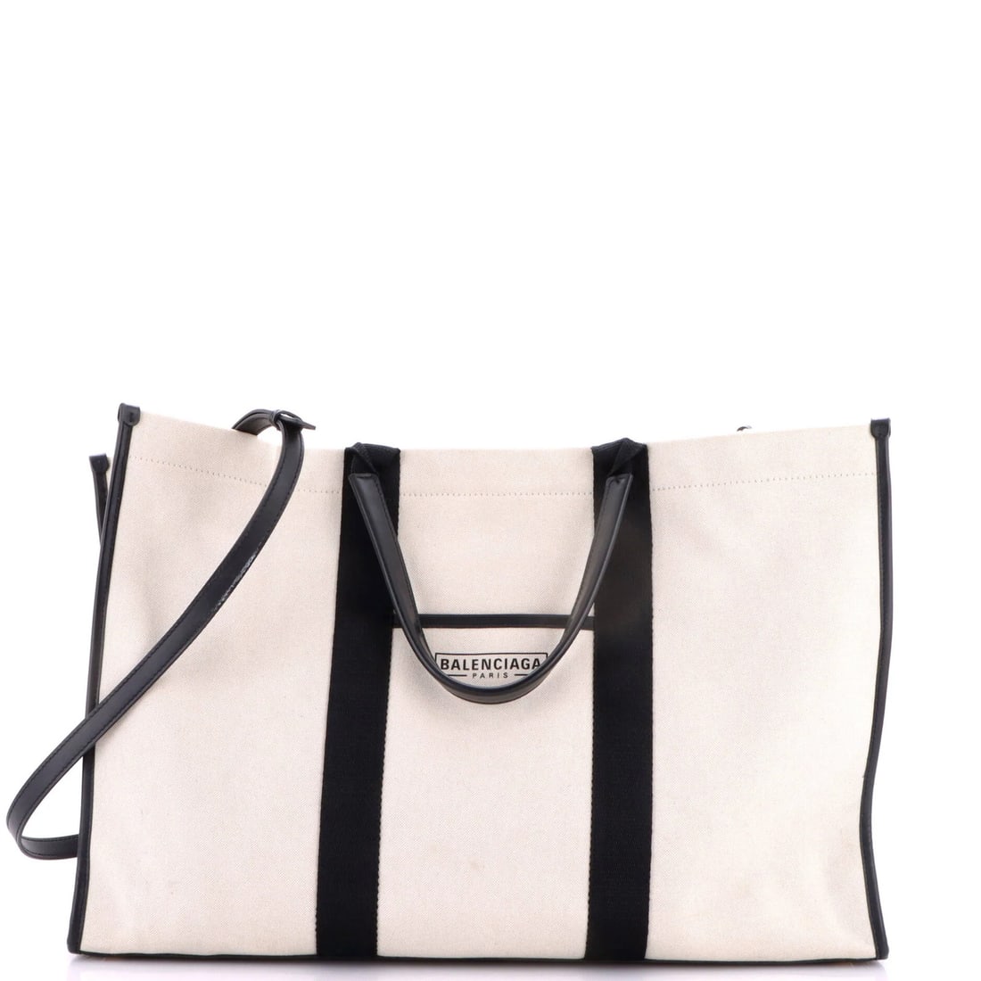 Balenciaga Hardware Tote Canvas Large: Balenciaga Hardware Tote Canvas Large Canvas Large Balenciaga Hardware Tote Exterior is made from plain canvas, with neutral color and gold hardware. This large tote measures 13" high, 19" wide, and