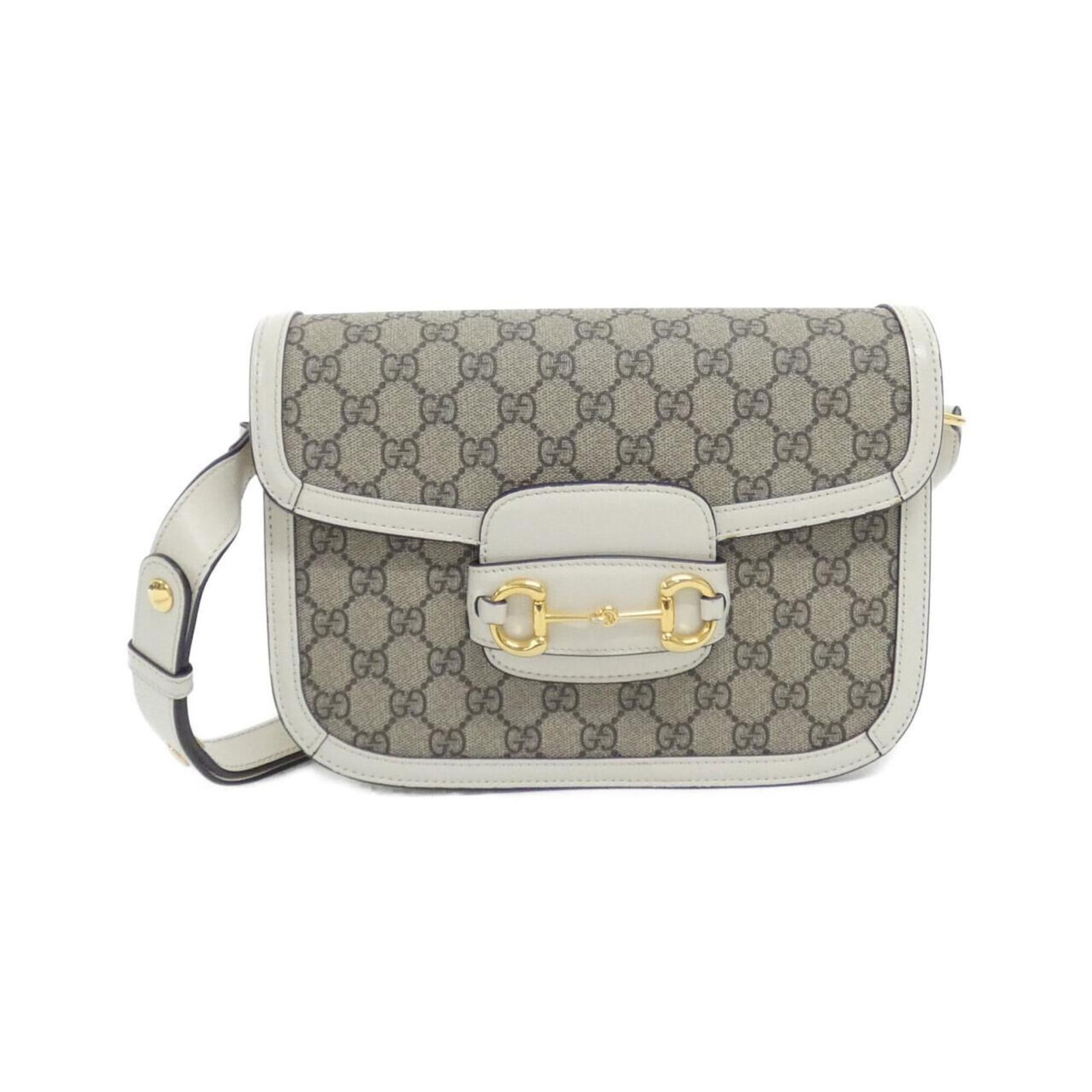 Gucci Shoulder Bag Gg Supreme Leather: Gucci Shoulder Bag Gg Supreme Leather Gucci's GG Supreme Leather shoulder bag boasts a classic design with a timeless beige and white color combination. Crafted from high-quality GG Supreme leather, t