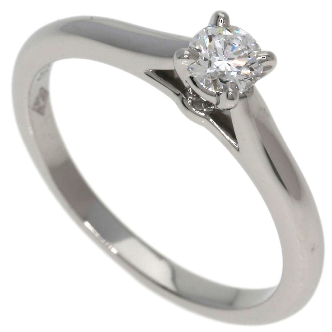 Cartier Solitaire Diamond # 49 Ring Platinum Pt950: Cartier Solitaire Diamond # 49 Ring Platinum Pt950 Platinum Pt950 Cartier ring featuring a stunning D color diamond weighing 0.19ct, showcasing exceptional brilliance and fire. The ring's silver