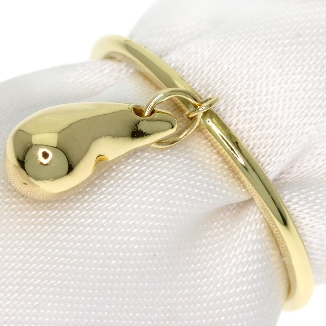Tiffany Co Teardrop K18 Yellow Gold: Tiffany Co Teardrop K18 Yellow Gold Tiffany Co Teardrop K18 Yellow Gold is a 18K yellow gold ring with a teardrop design, featuring a 4(US) ring size. This piece bears a signature and is made from