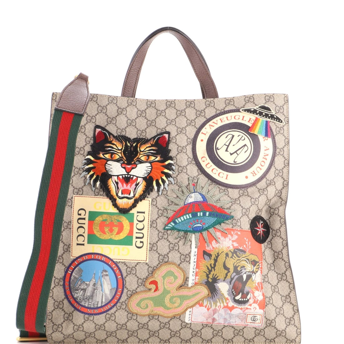 Soft Gucci Coated GG North Canvas Convertible Open Tote Applique With: Soft Gucci Coated GG North Canvas Convertible Open Tote Applique With Soft and stylish, this Gucci Coated GG North Canvas Convertible Open Tote features a unique applique design and a spacious