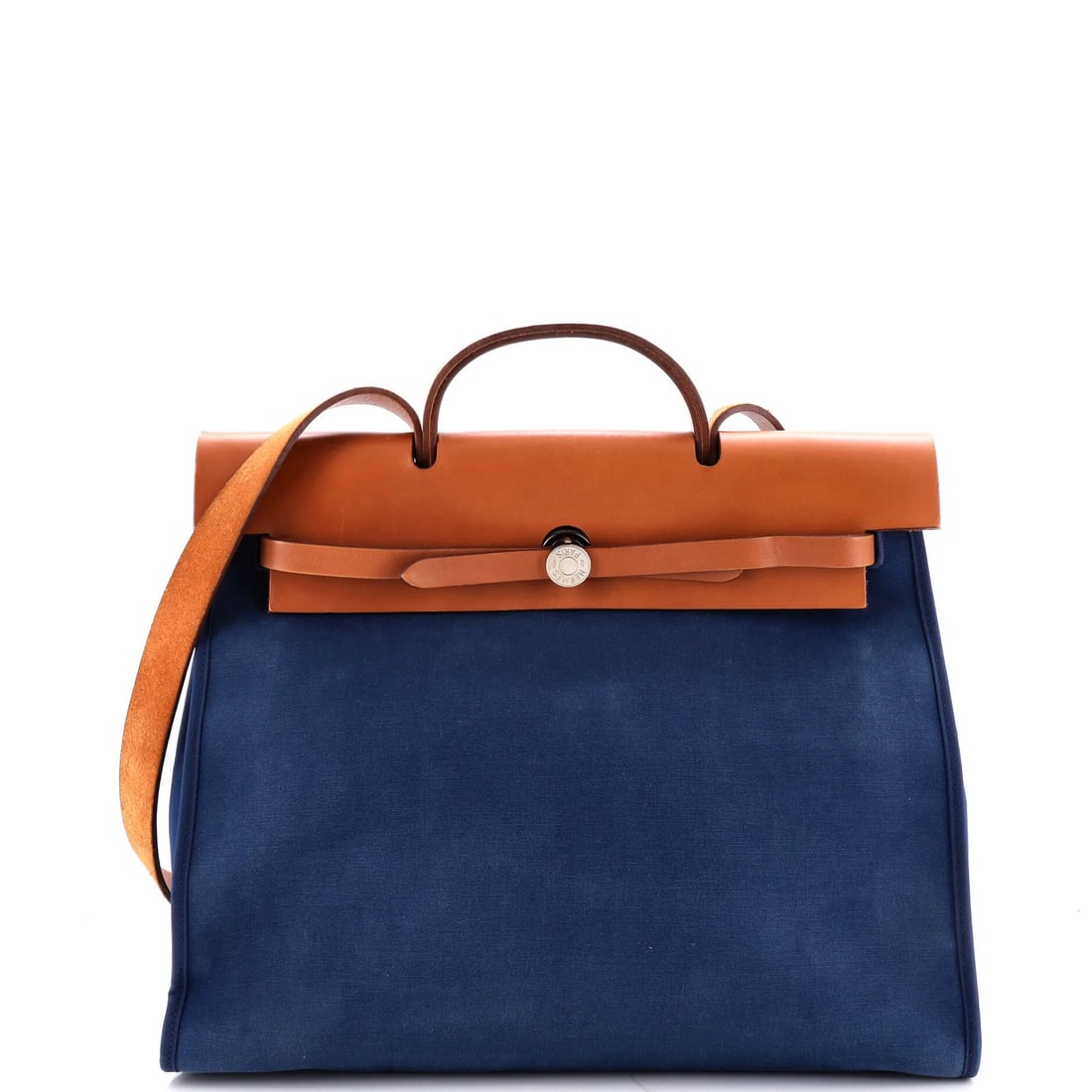 Hermes Herbag Zip Leather Toile 39: Hermes Herbag Zip Leather Toile 39 The Hermes Herbag Zip Leather Toile 39 is a unique and stylish handbag featuring a blue canvas exterior with a heavy discoloration throughout, scuffs, and a cor.