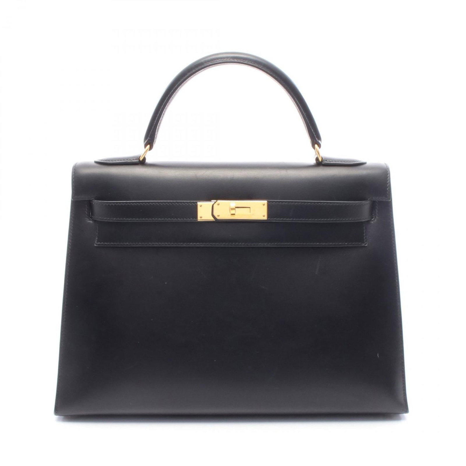 Calf Leather Handbag Box Hermes: Calf Leather Handbag Box Hermes Box calf leather construction provides a rich, luxurious feel to this black handbag. Measuring 23cm x 32cm x 12cm, it offers a compact size with a sturdy design. The si