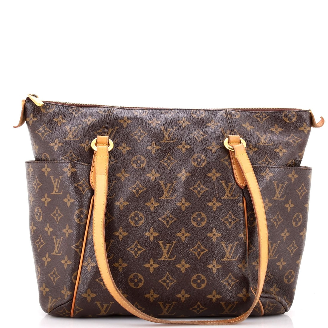 Totally Handbag Louis Vuitton GM Monogram Canvas: Totally Handbag Louis Vuitton GM Monogram Canvas Totally Handbag's Louis Vuitton GM Monogram Canvas shoulder bag boasts a classic design with a timeless brown canvas exterior. The bag features a gold-