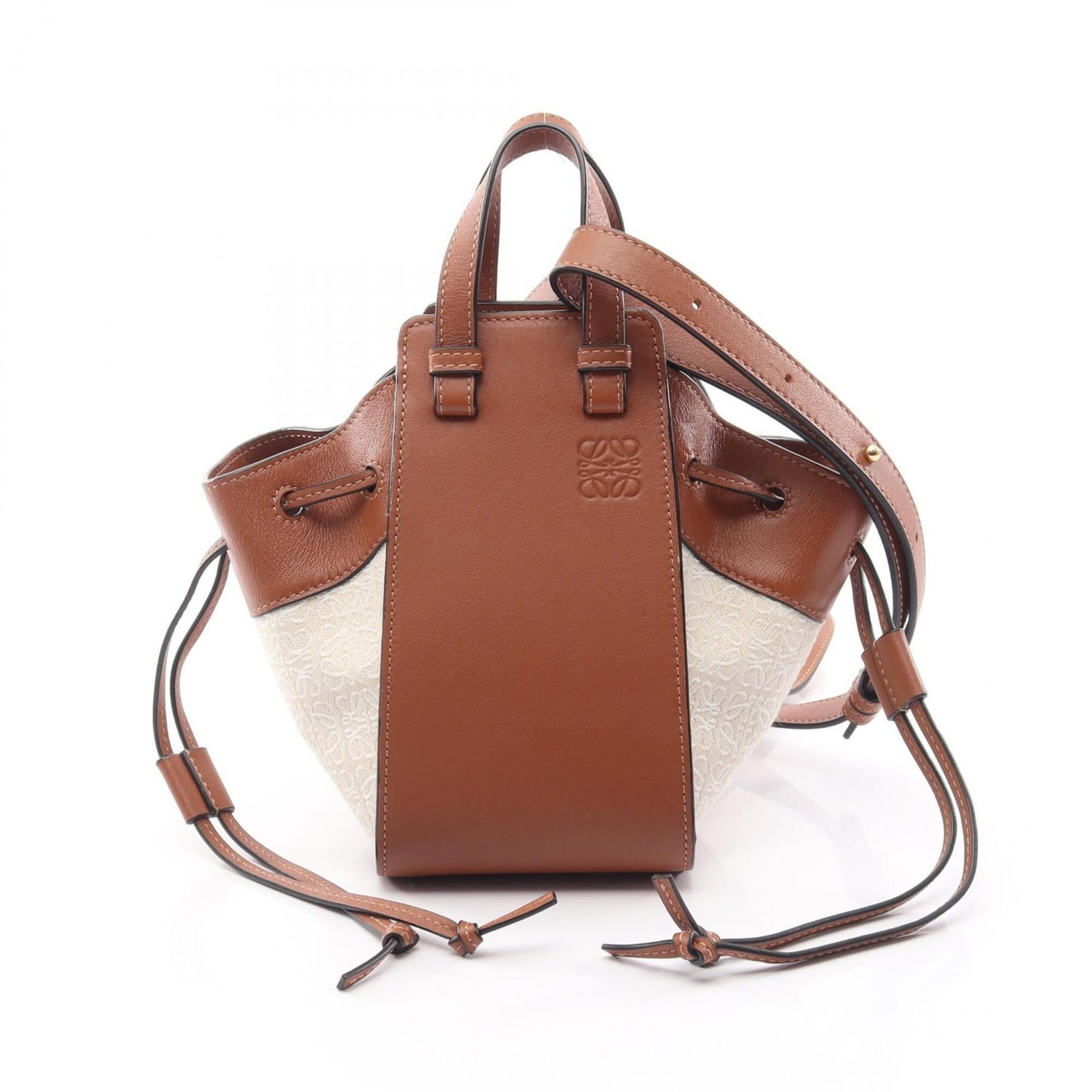 Canvas Leather Handbag Loewe: Canvas Leather Handbag Loewe Canvas Leather Handbag Loewe is a stylish women's handbag featuring a combination of canvas and leather materials. Measuring 21cm x 10.5cm x 13.5cm, it boasts a classic