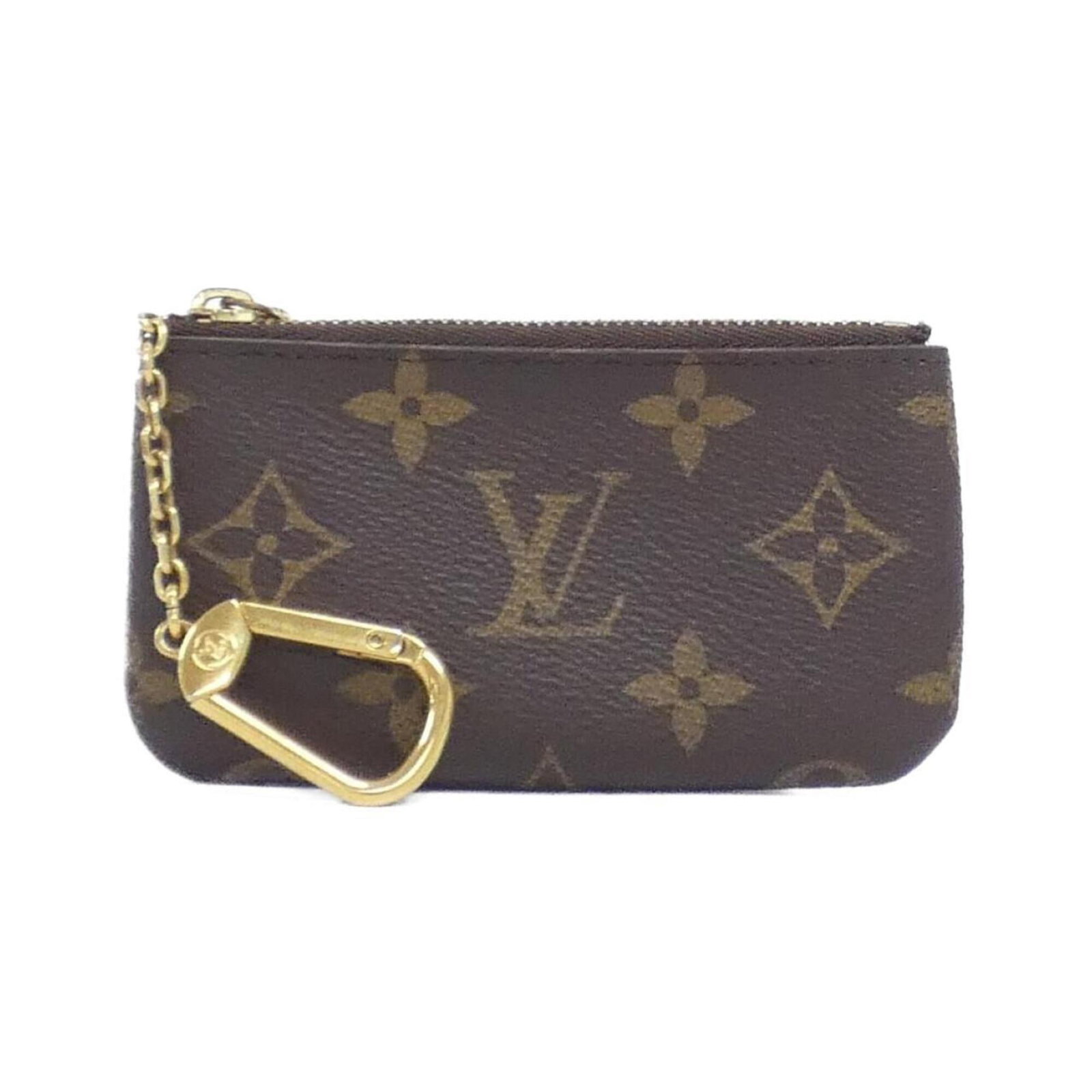 Louis Vuitton Coin Purse/ Coin Case Coated Canvas: Louis Vuitton Coin Purse/ Coin Case Coated Canvas Coated canvas construction provides a durable and stylish finish for this Louis Vuitton coin purse, with a signature monogram pattern that adds a
