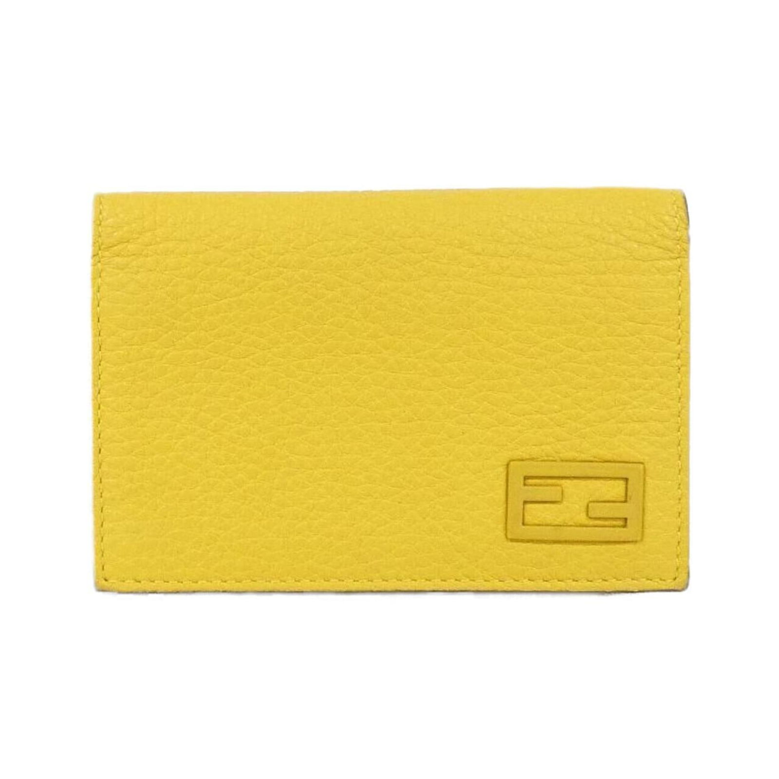 Case Card Leather Fendi: Case Card Leather Fendi Case Card Leather Fendi is a stylish card case made from high-quality calfskin leather, available in a vibrant yellow color. Measuring 7.5cm x 11cm x 1.5cm, this compact case f
