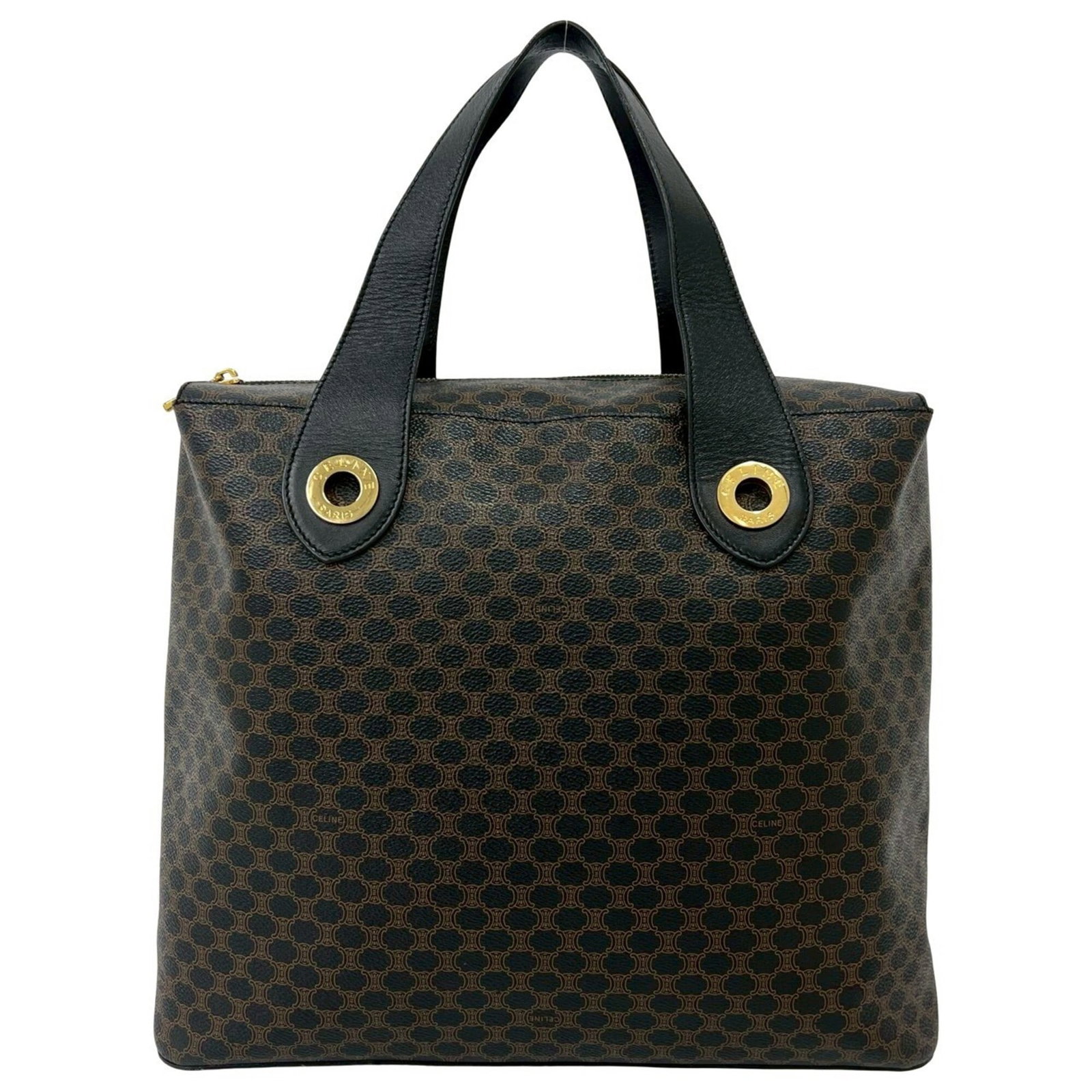 Handbag Tote Celine Leather Pvc: Handbag Tote Celine Leather Pvc Black or Brown Celine Leather PVC Handbag Tote. Made from a combination of leather and PVC, this bag features a classic design with a 29cm x 34.5cm x 13.5cm size. This