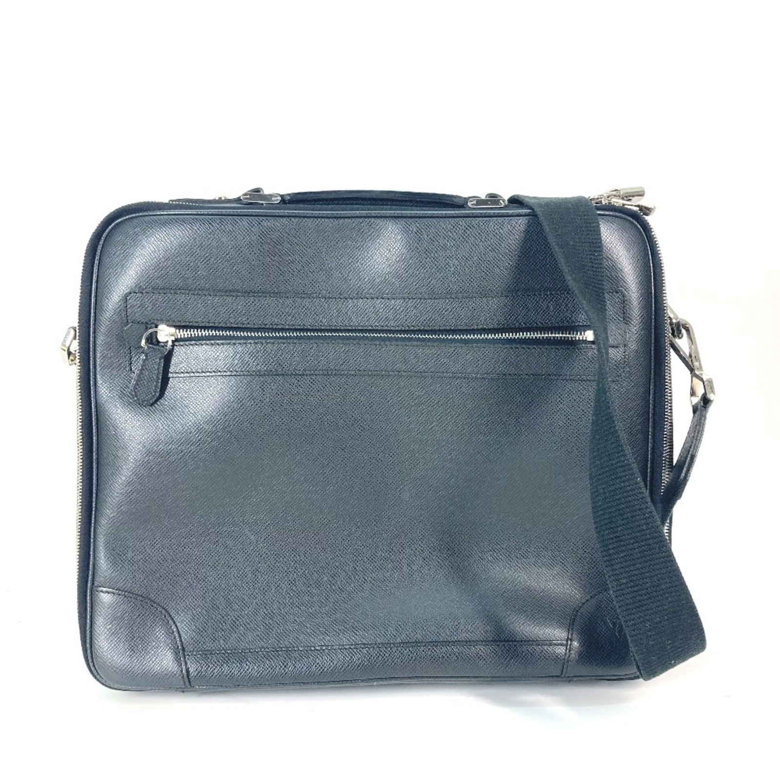 Vuitton Handbag Leather Taiga Shoulder Bag: Vuitton Handbag Leather Taiga Shoulder Bag Taiga leather in Ardoise and Black, this Louis Vuitton M32522 shoulder bag features an open outer pocket with a zipper closure, providing a practical and