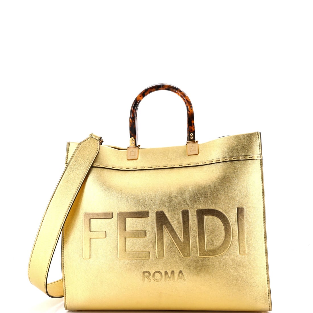 Tote shopper medium leather Fendi: Tote shopper medium leather Fendi Gold Fendi Sunshine Shopper Tote Medium Leather Bag. This medium leather tote features a gold exterior with minor scuffs, gold hardware with scratches, and a gold