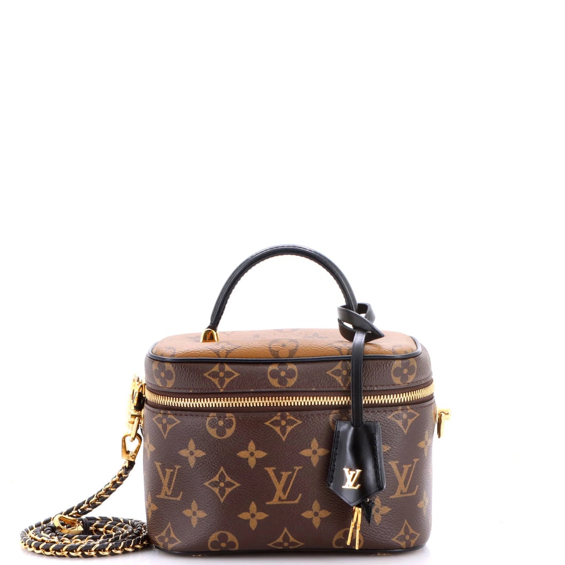 Vanity Handbag Canvas Monogram Reverse Louis Vuitton: Vanity Handbag Canvas Monogram Reverse Louis Vuitton Brown Canvas Monogram Reverse Louis Vuitton Handbag with Top Handle, Keys Lock, and Gold Hardware. This Vanity Handbag features a classic design
