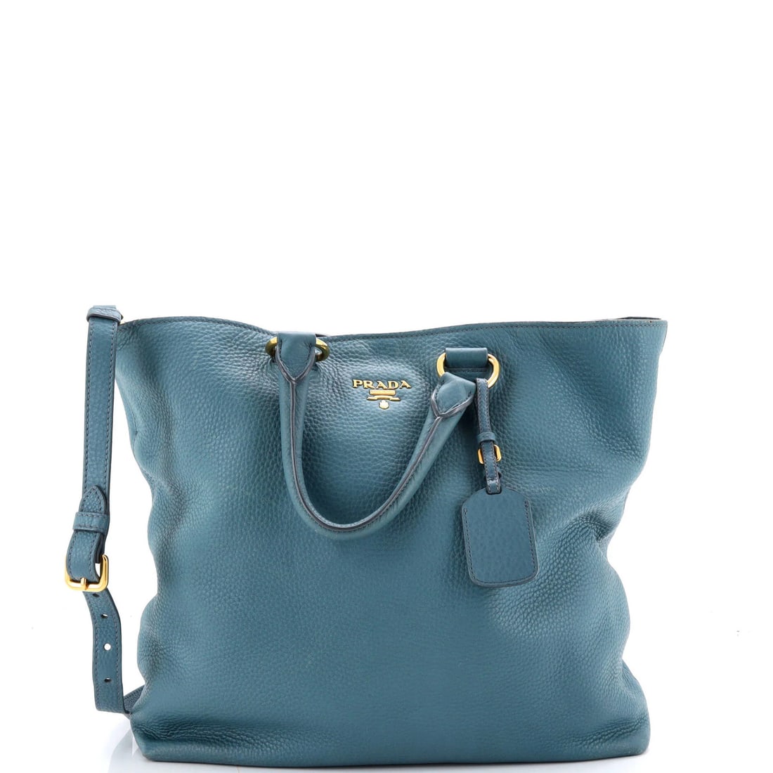 Prada Convertible Shopper Tote Vitello Daino Large: Prada Convertible Shopper Tote Vitello Daino Large The Prada Convertible Shopper Tote Vitello Daino Large boasts a striking blue exterior with heavy cracking on corners and creases, adding a unique