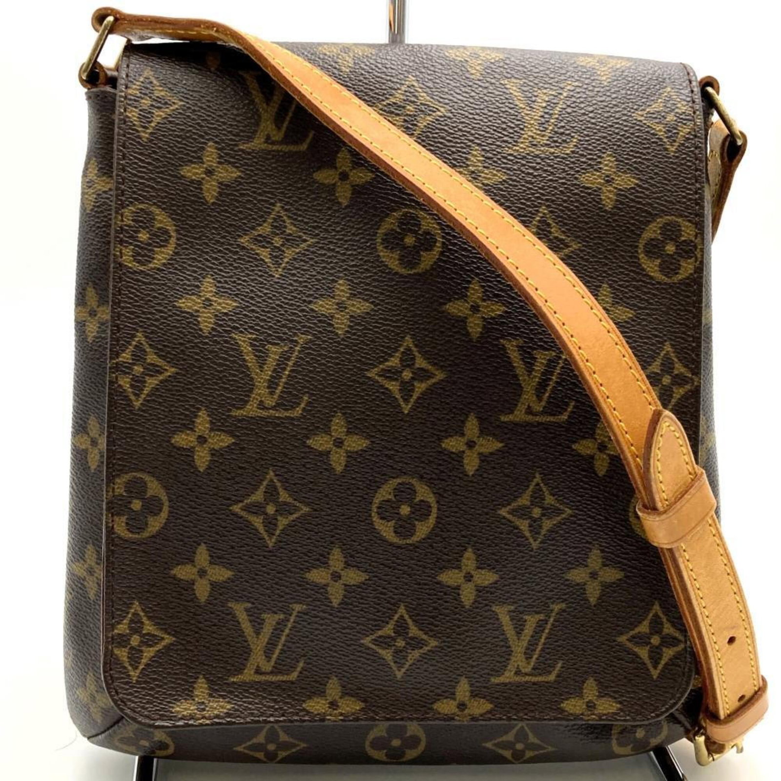 Shoulder Bag Monogram Louis Vuitton: Shoulder Bag Monogram Louis Vuitton Brown Monogram Louis Vuitton Shoulder Bag. This classic bag features the iconic monogram pattern in brown, with a signature that bears a mark of authenticity. With