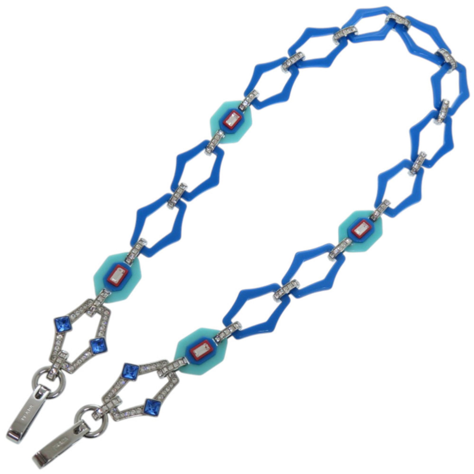 Rhinestone Plastic Strap Prada: Rhinestone Plastic Strap Prada The Rhinestone Plastic Strap Prada boasts a striking blue and red color combination, adorned with intricate rhinestones that add a touch of glamour. Measuring 3.5cm x 89