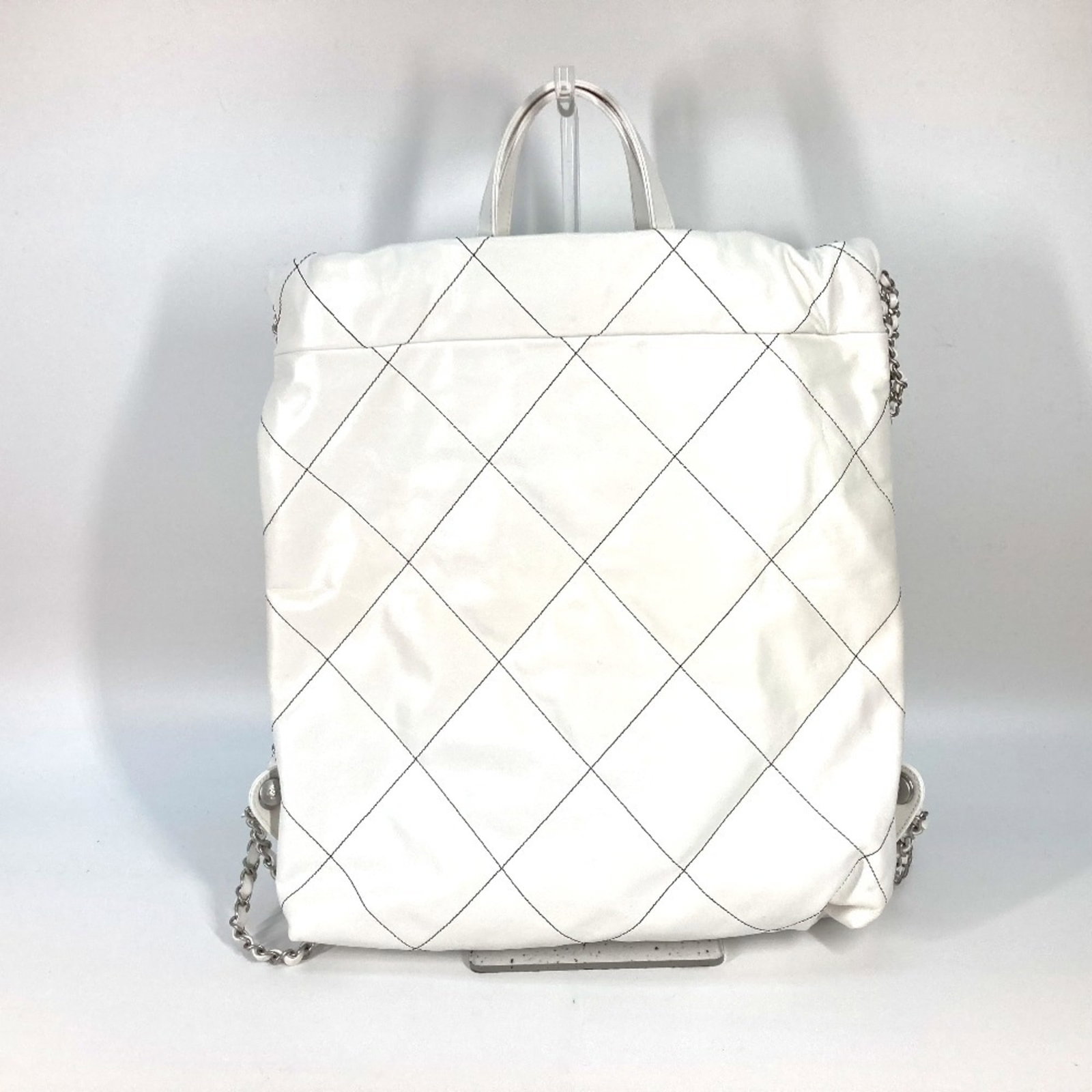 Backpack Leather By Chanel: Backpack Leather By Chanel Black and White Lambskin Leather Backpack by Chanel, featuring a sleek design and durable construction. Made from high-quality lambskin leather, this backpack boasts a timel