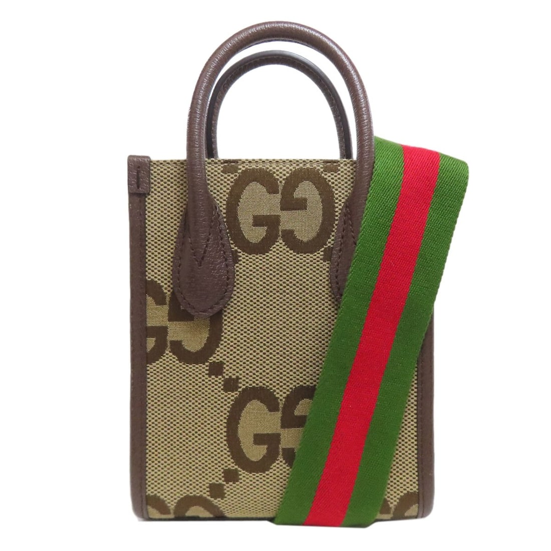 Jumbo Gg Mini Tote Bag 2Way Handbag Gucci Calf Canvas: Jumbo Gg Mini Tote Bag 2Way Handbag Gucci Calf Canvas Brown canvas Jumbo Gg Mini Tote Bag with 2Way design. This handbag features a signature and is made from high-quality canvas material. The