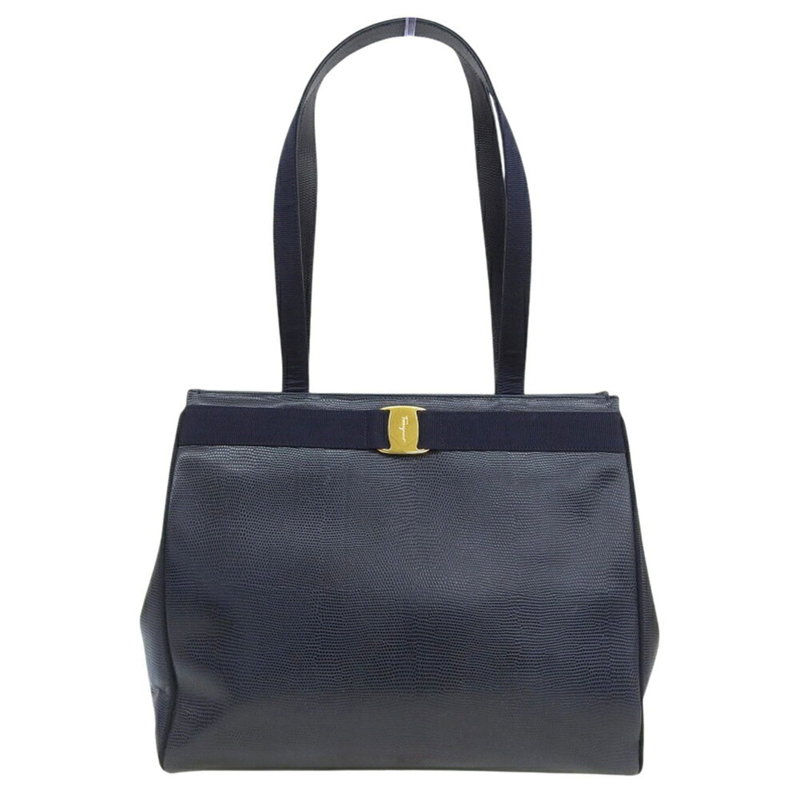 Bag Leather Salvatore Ferragamo Tote: Bag Leather Salvatore Ferragamo Tote Navy leather tote bag from Salvatore Ferragamo, featuring a classic design with a 65cm handle and a magnet closure. The bag comes with a dust bag for added
