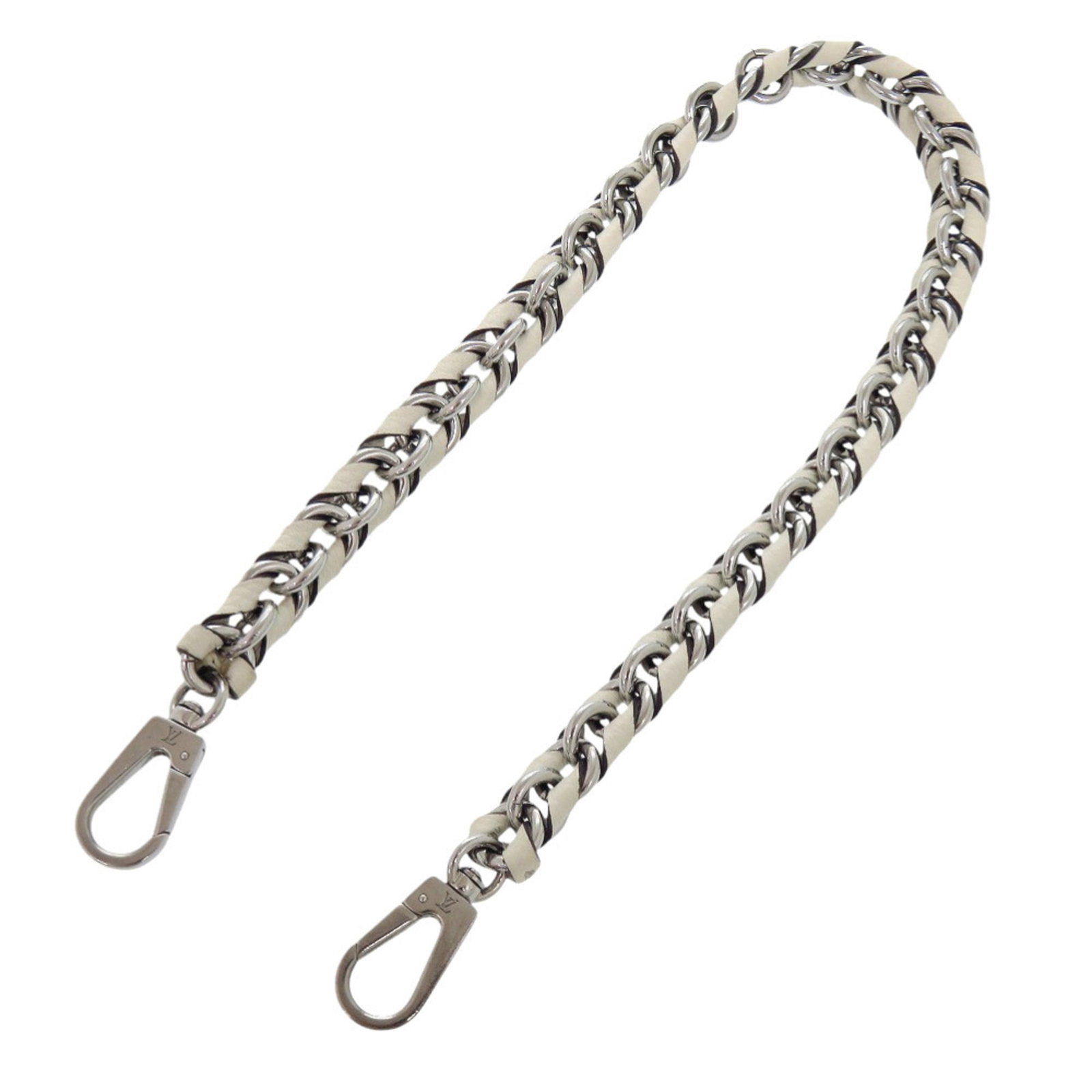 Louis Vuitton Strap Leather Metal: Louis Vuitton Strap Leather Metal The Louis Vuitton Strap Leather Metal is a high-quality accessory featuring a striking ivory and silver design. Made from durable leather and metal, this strap boasts