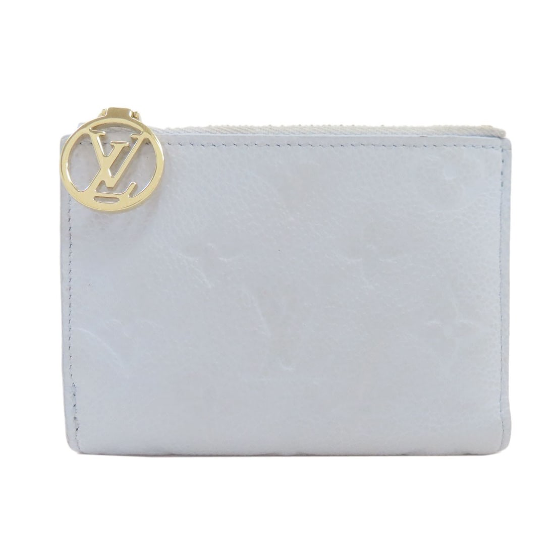 Louis Vuitton M83587 Portefeiulle Lisa Bifold Wallet With Coin Pocket: Louis Vuitton M83587 Portefeiulle Lisa Bifold Wallet With Coin Pocket Blue Empreinte Bifold Wallet with Coin Pocket. This Louis Vuitton M83587 Portefeiulle Lisa features a classic bifold design with