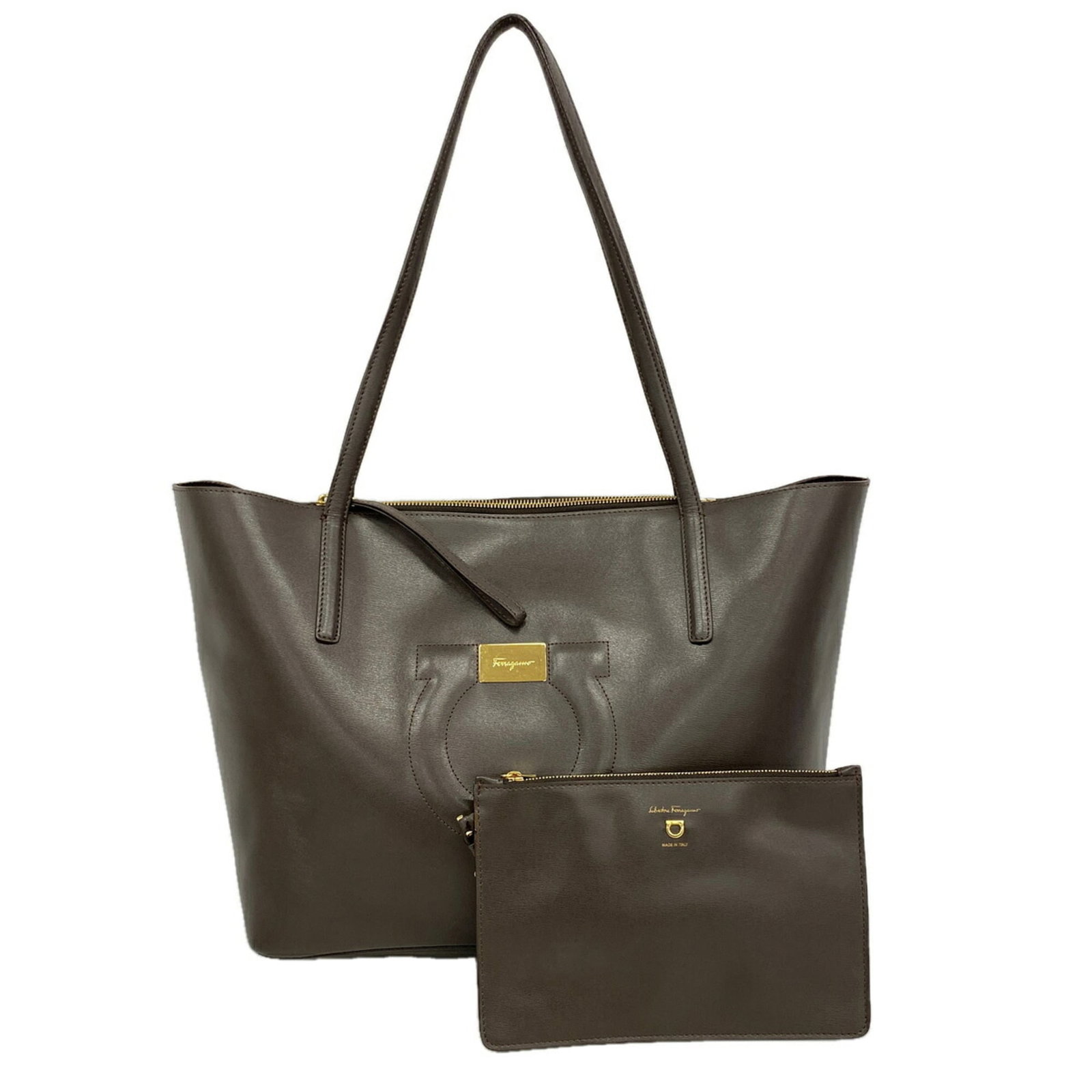 Bag Leather Salvatore Ferragamo Tote: Bag Leather Salvatore Ferragamo Tote Brown leather Salvatore Ferragamo tote bag with gold hardware, measuring 29cm x 34cm x 15.5cm. This classic tote features a timeless design and premium leather